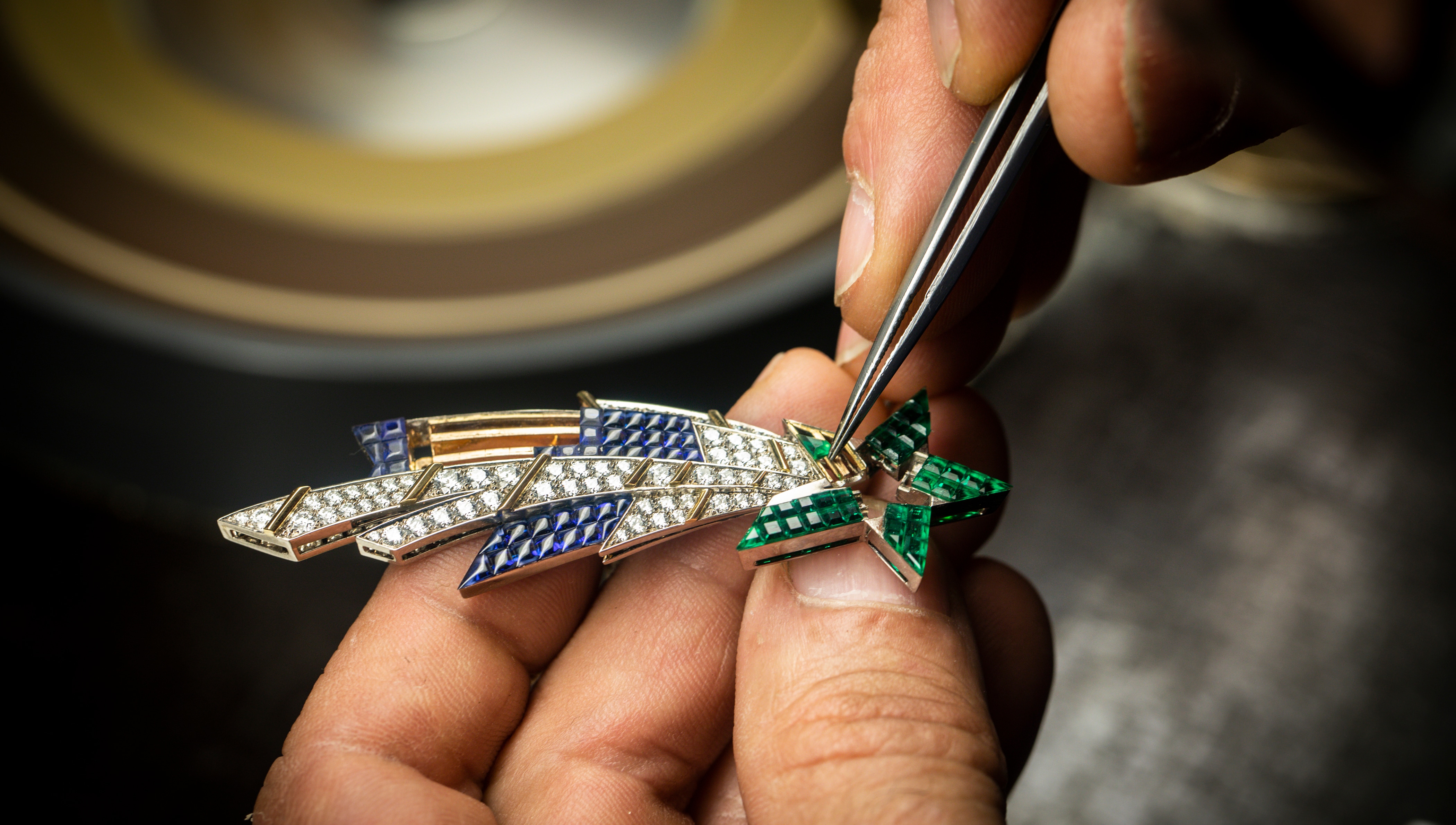 Positioning the Traditional Mystery Set emeralds on the shooting star, Planétarium Automaton, Van Cleef & Arpels.