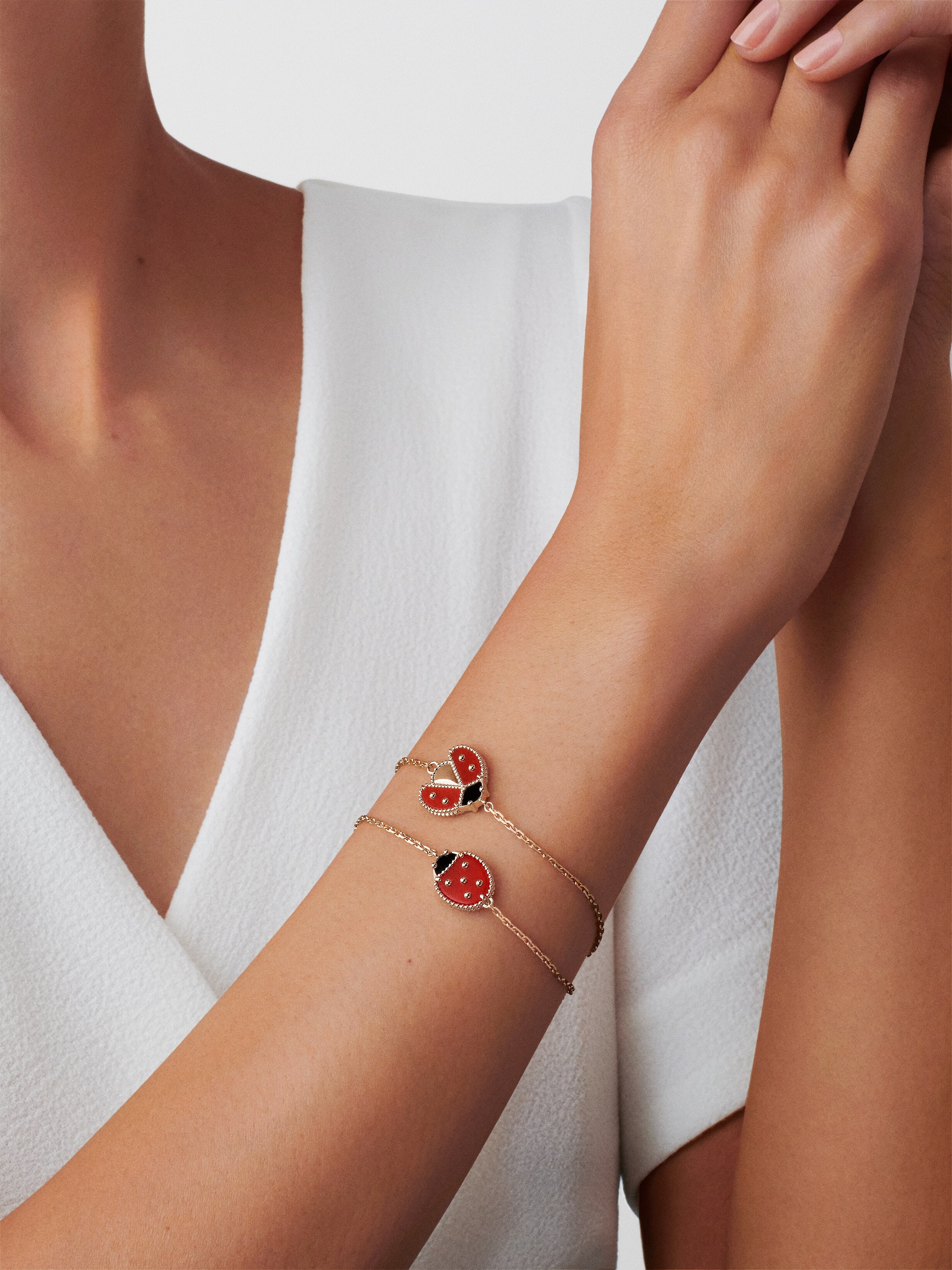 Lucky Spring bracelet, 5 motifs 18K rose gold, Carnelian, Mother-of-pearl,  Onyx- Van Cleef & Arpels