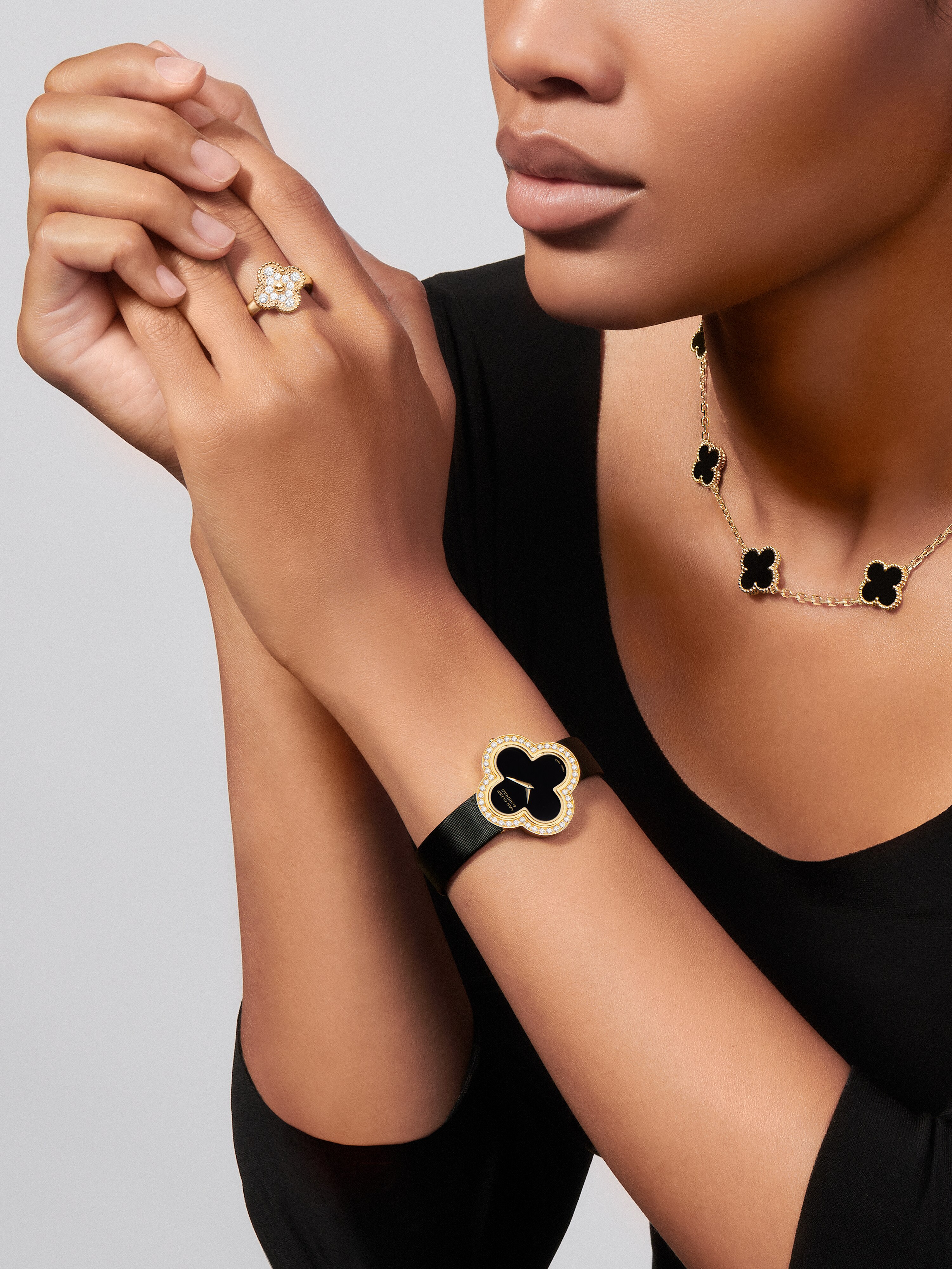 Alhambra watch, medium model, 18K yellow gold, Diamond:  44 stones,  0.75 carat, Onyx:  1 stone, Worn Detail, Watch - Van Cleef & Arpels