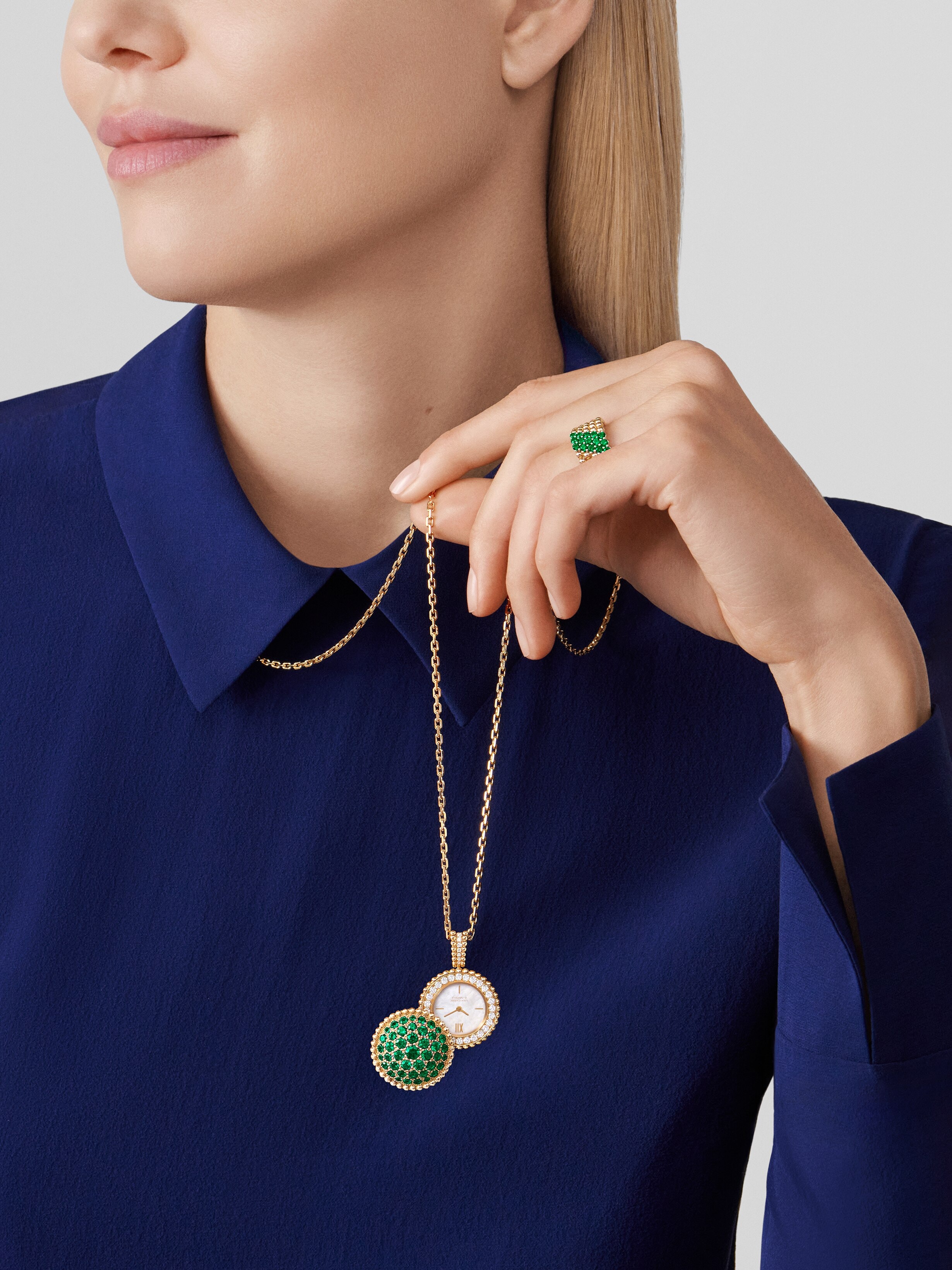 Perlée secret pendant watch, 18K yellow gold, Diamond:  40 stones,  0.92 carat, Emerald:  43 stones,  3.52 carats, Mother-of-pearl:  1 stone, Worn Alternative, Watch - Van Cleef & Arpels