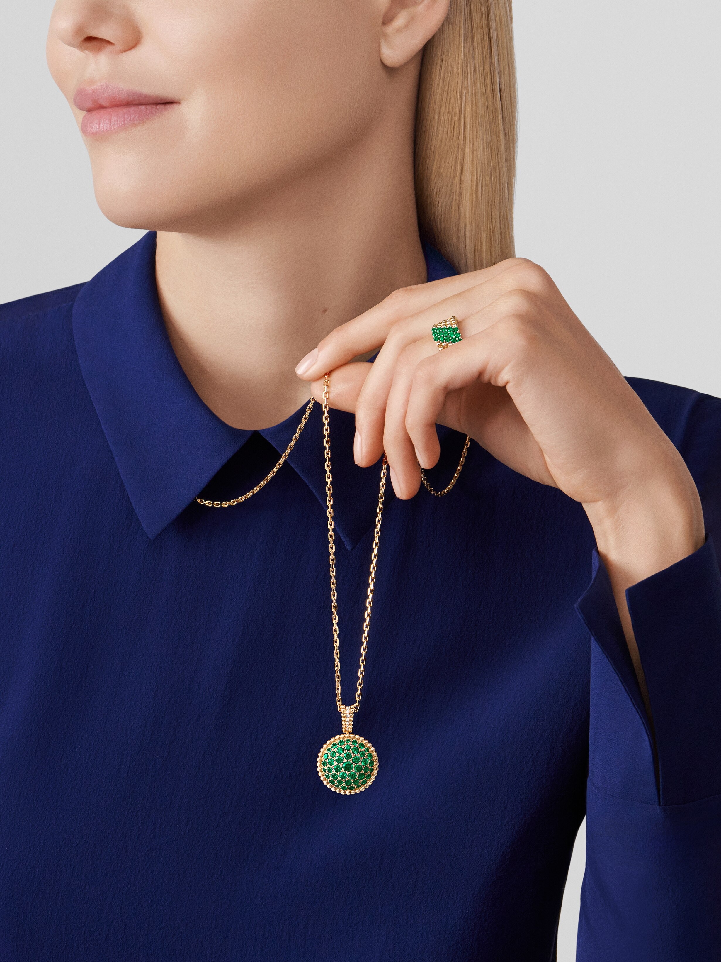 Perlée secret pendant watch, 18K yellow gold, Diamond:  40 stones,  0.92 carat, Emerald:  43 stones,  3.52 carats, Mother-of-pearl:  1 stone, Worn Detail, Watch - Van Cleef & Arpels