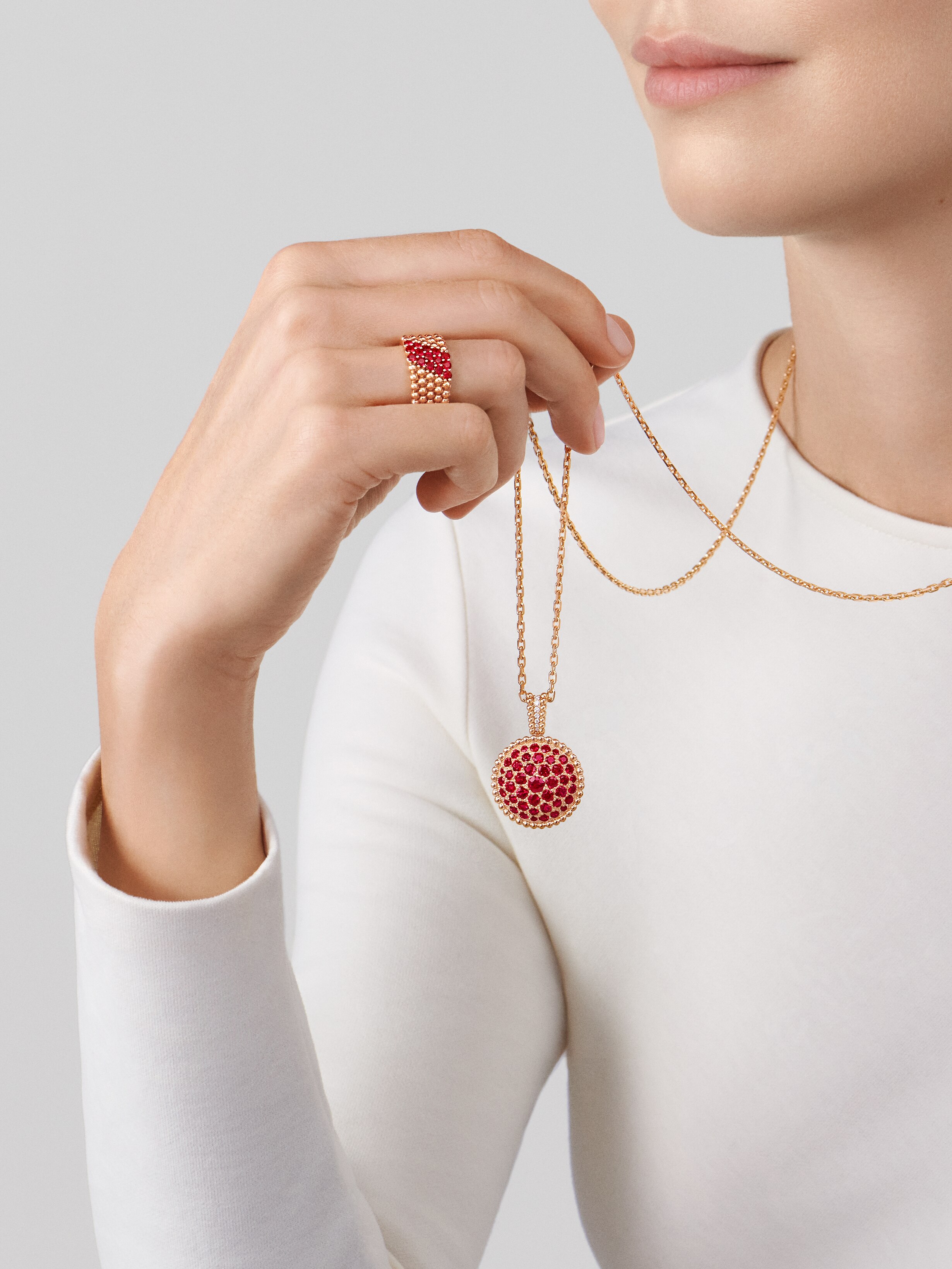 Perlée secret pendant watch, 18K rose gold, Diamond:  40 stones,  0.92 carat, Mother-of-pearl:  1 stone, Ruby:  43 stones,  5.23 carats, Worn Alternative, Watch - Van Cleef & Arpels