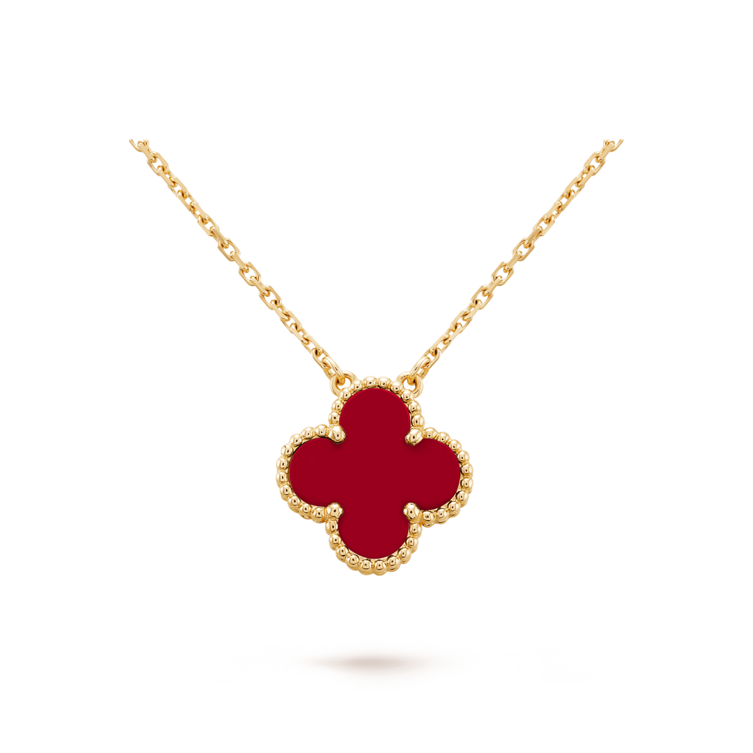 Vintage Alhambra pendant, 18K yellow gold, carnelian. Alhambra collection, Van Cleef & Arpels.