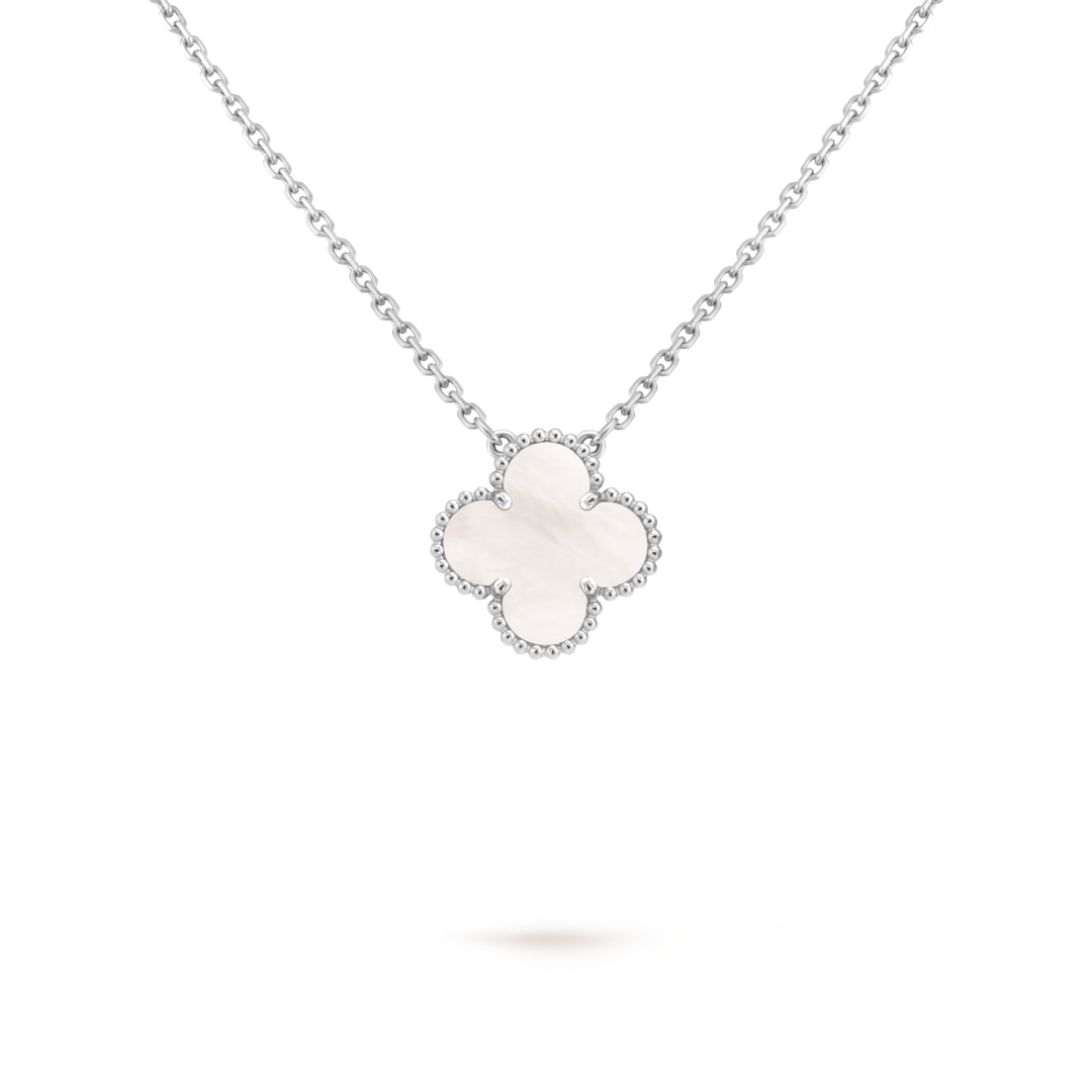 Vintage Alhambra pendant, rhodium plated 18K white gold, white mother-of-pearl. Alhambra collection, Van Cleef & Arpels.