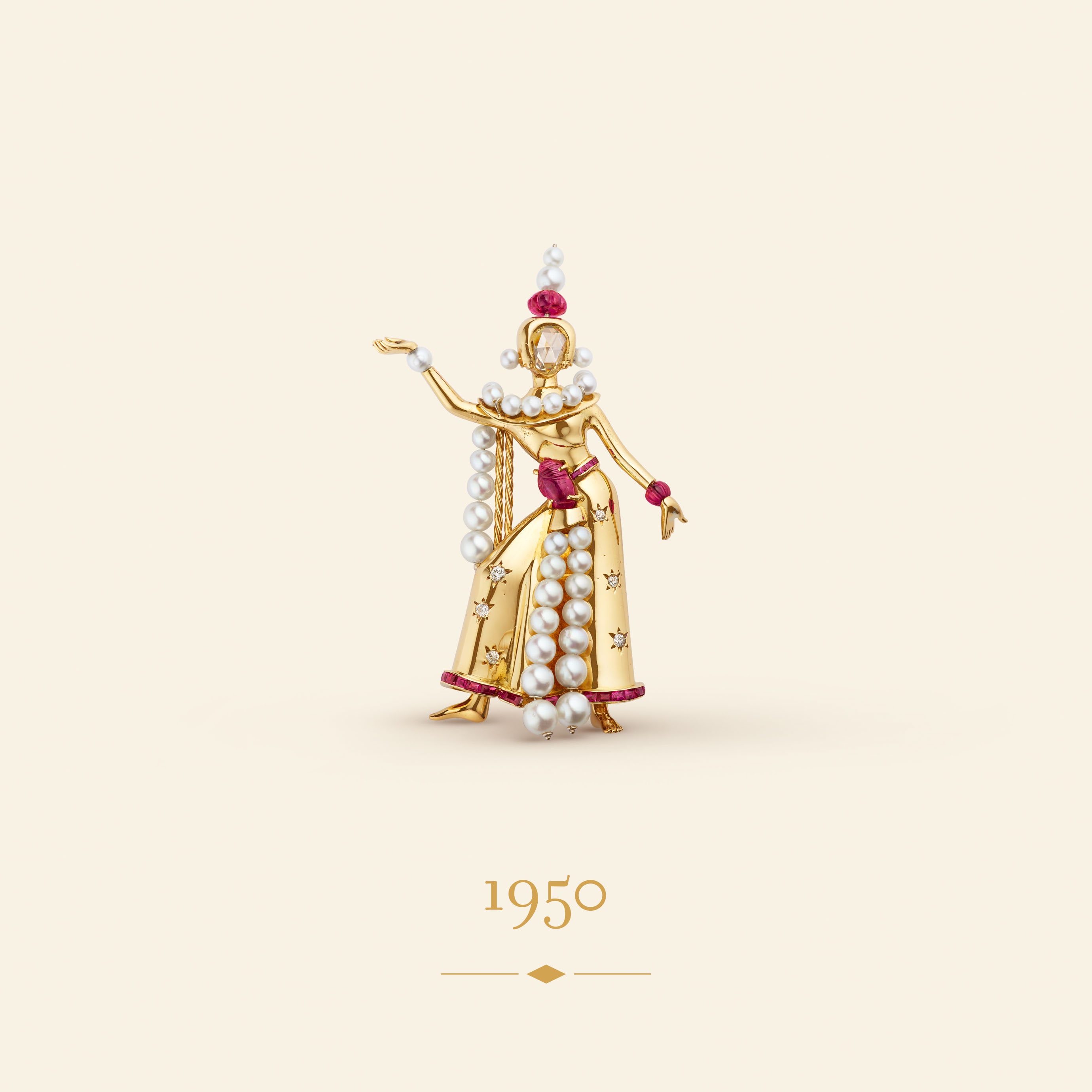 Balinese Dancer clip, 1950​. Yellow gold, white gold, rubies, cultured pearls, diamonds​. Van Cleef & Arpels Collection.