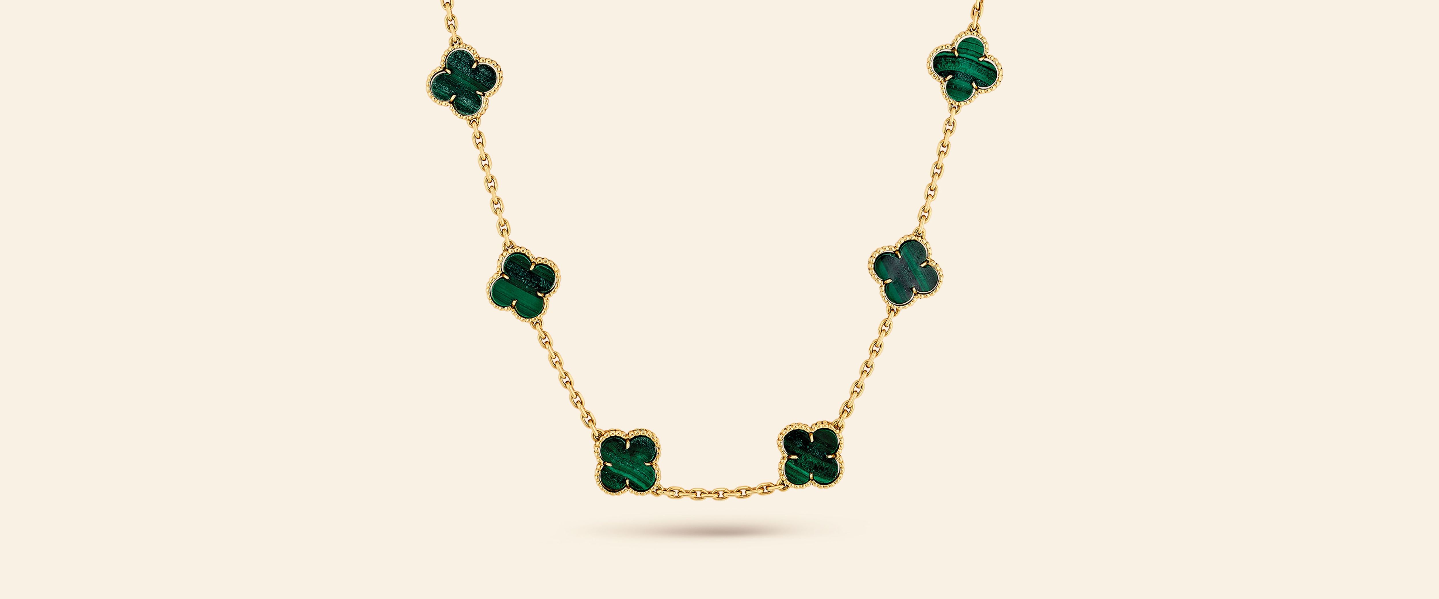 Alhambra long necklace, 1973​. Yellow gold, malachite​. Van Cleef & Arpels Collection​.