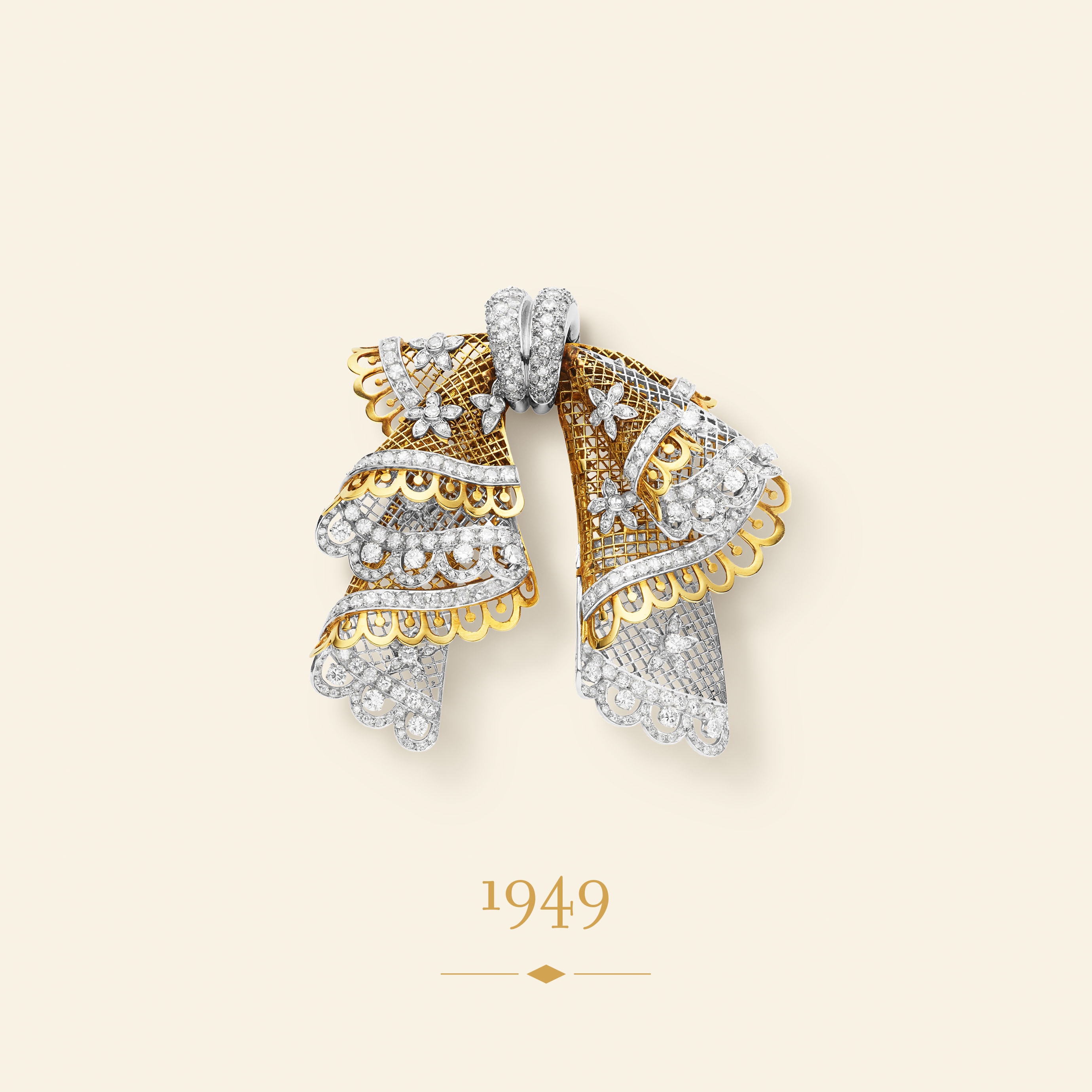 Lace Bow clip, 1949​. Platinum, yellow gold, diamonds​. Van Cleef & Arpels Collection.
