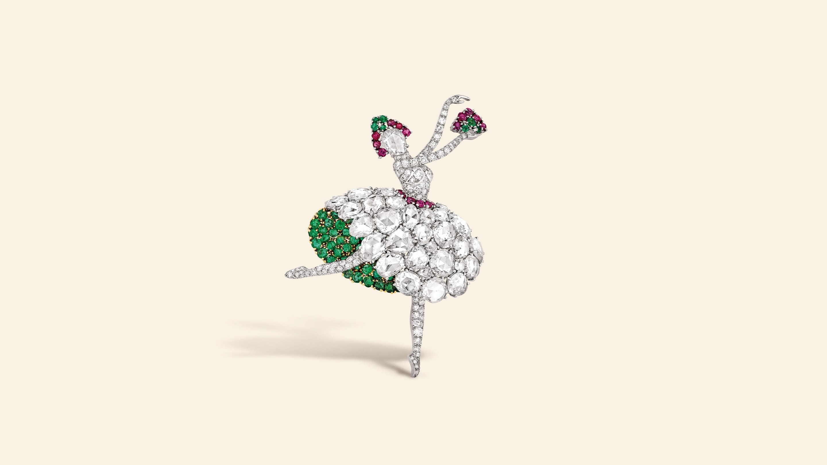 Dancer clip, 1941​. Platinum, yellow gold, emeralds, rubies, diamonds​. Van Cleef & Arpels Collection.