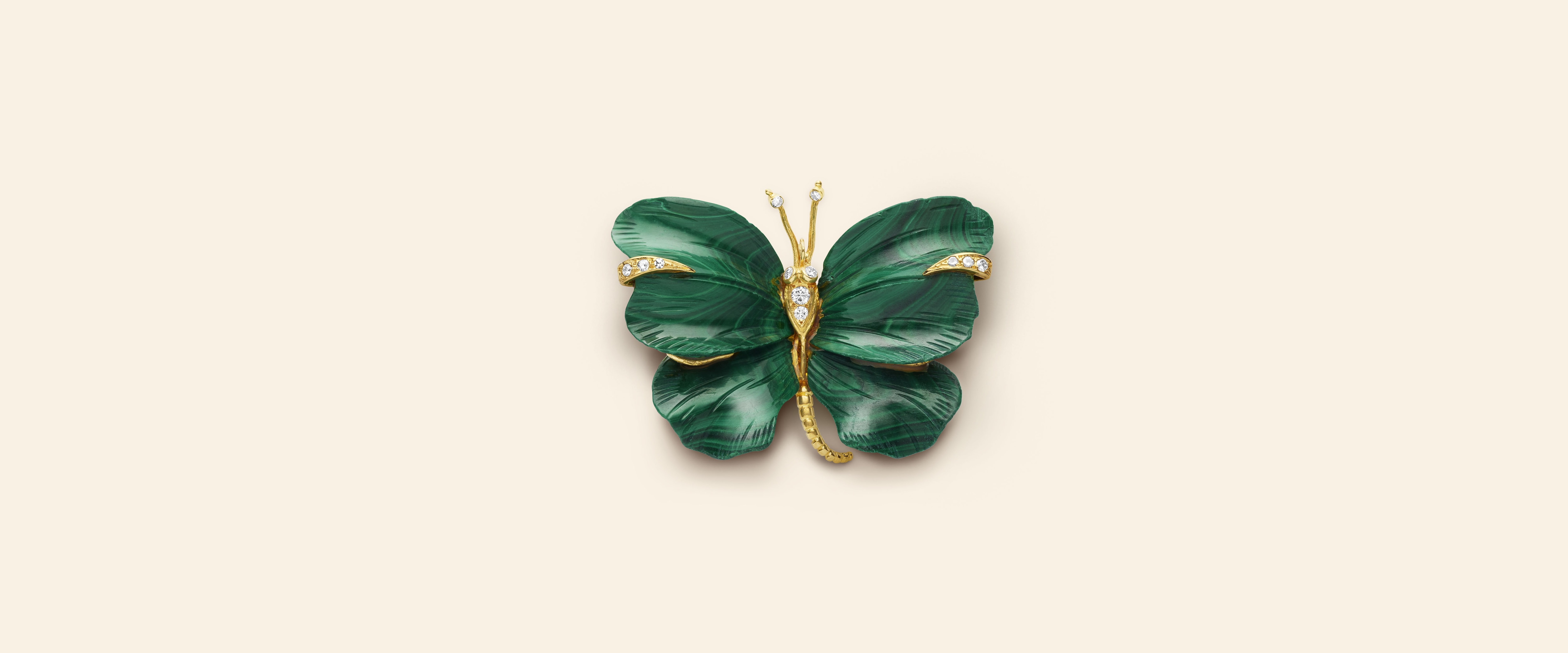 Butterfly胸针，约1971年。黄K金，白K金，孔雀石，钻石。Van Cleef & Arpels梵克雅宝典藏。
