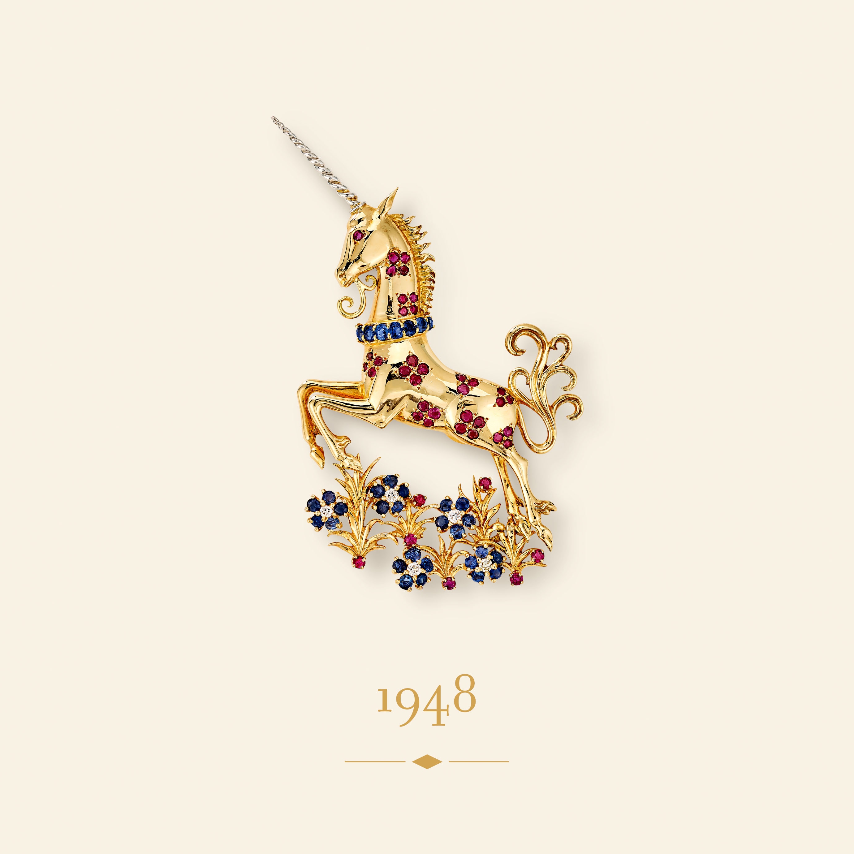 Unicorn clip, 1948​. Yellow gold, white gold, rubies, sapphires, diamonds​. Van Cleef & Arpels Collection.
