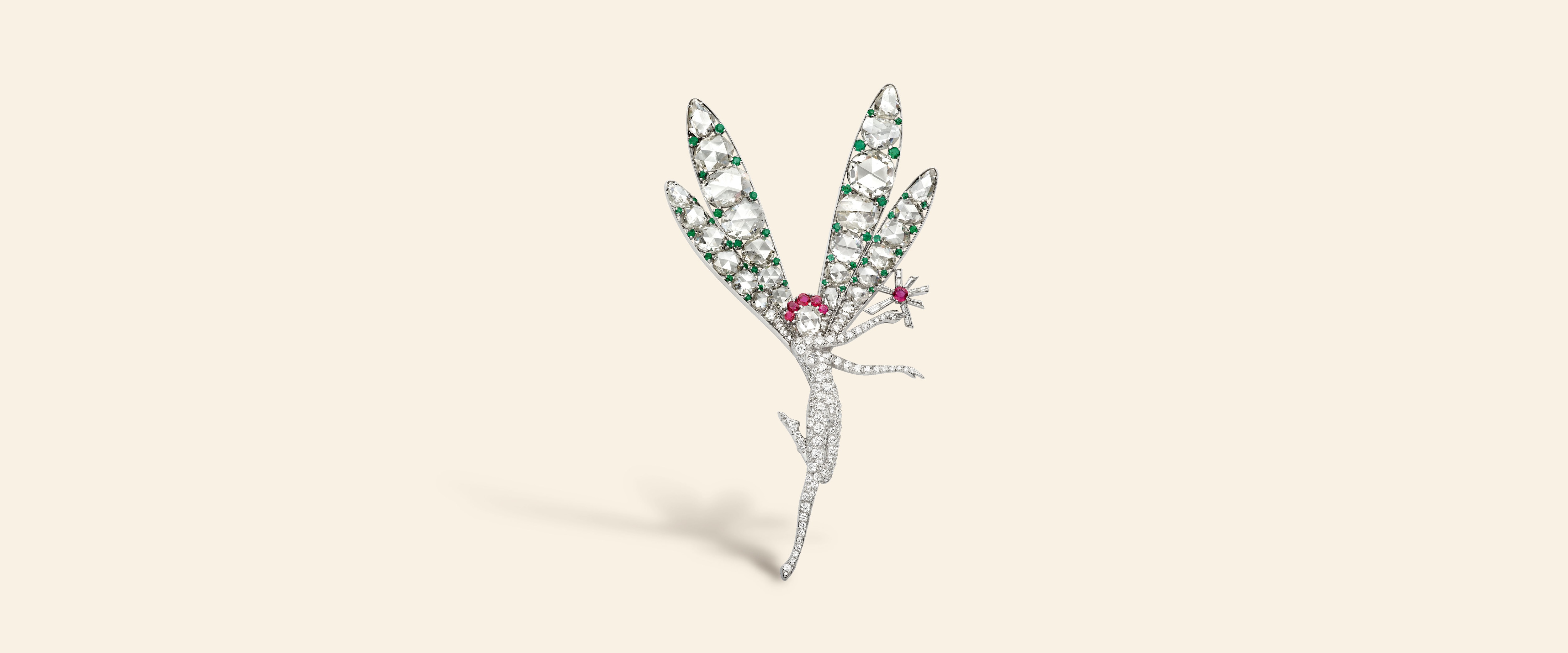 Little Winged Fairy clip, later named Spirit of Beauty, 1941​. Platinum, emeralds, rubies, diamonds​. Purchased by the American socialite Barbara Hutton for a friend. Van Cleef & Arpels Collection​.
