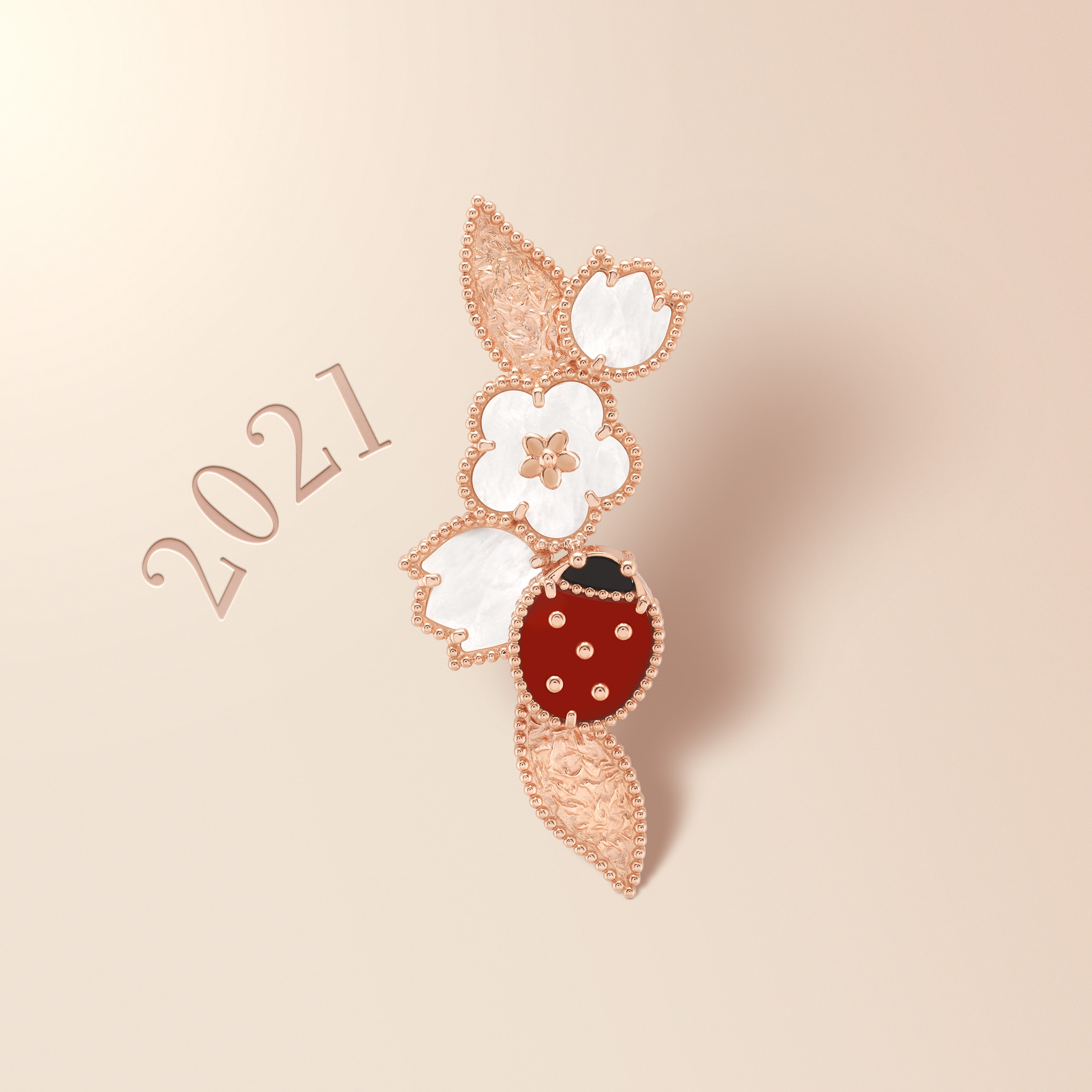 Lucky Spring Collection, 2021. Clip, 18K rose gold, white mother-of-pearl, carnelian, onyx. Van Cleef & Arpels.