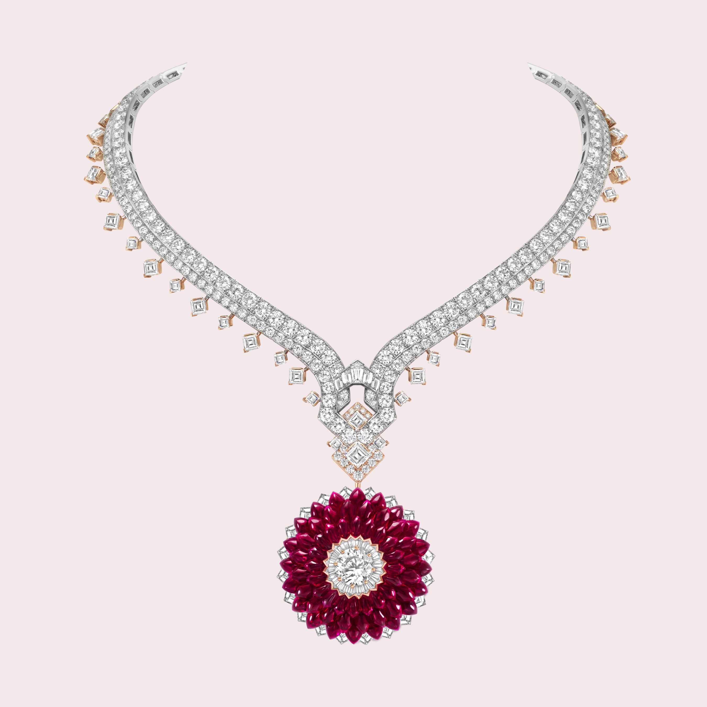 View of the Italian rose transformable clip worn as a necklace, white gold, rose gold, Navette Mystery Set™ buff-topped rubies, diamonds. Romeo & Juliet High Jewelry collection, Van Cleef & Arpels.