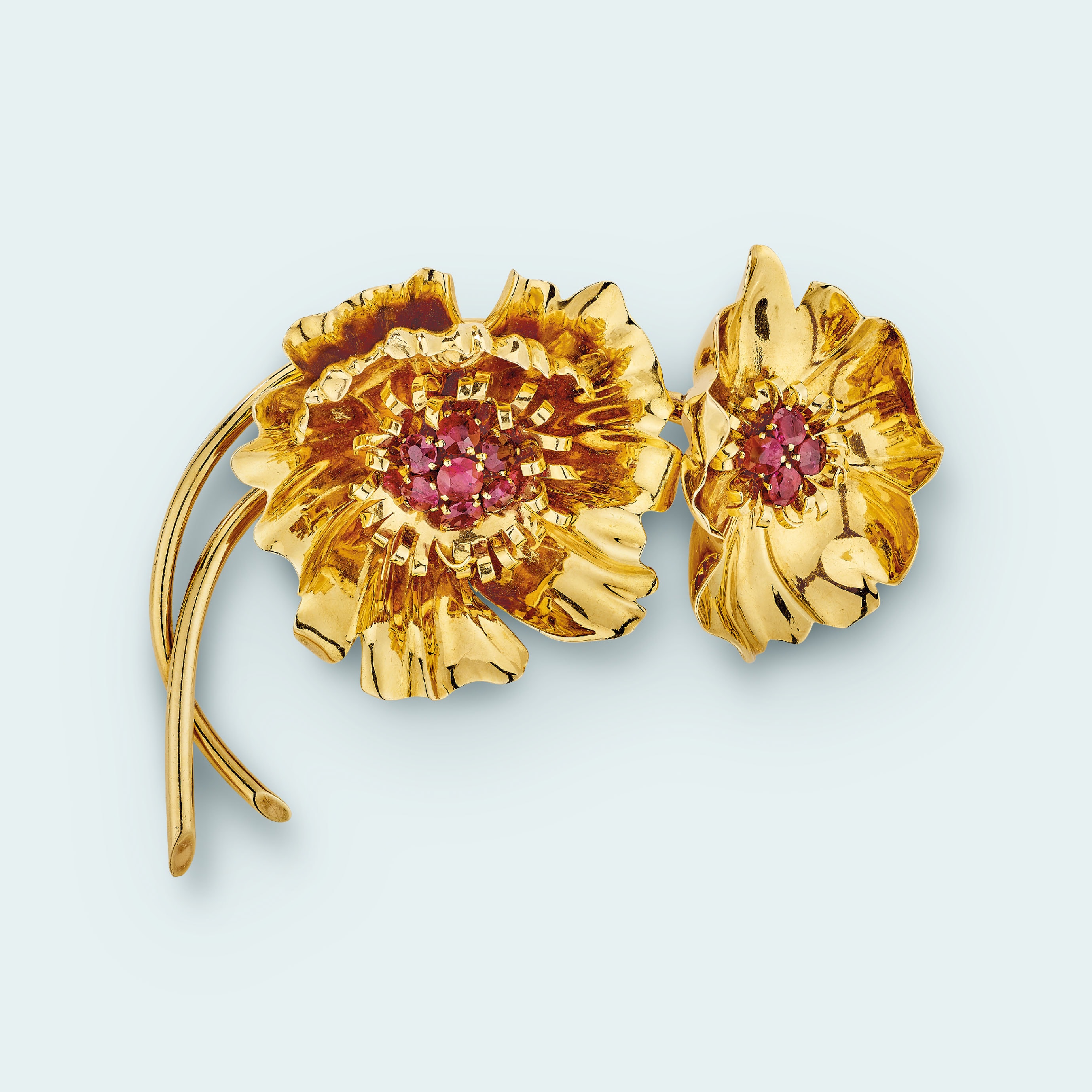 Anemone clip, 1938. 18K yellow gold, rubies. Van Cleef & Arpels Collection.