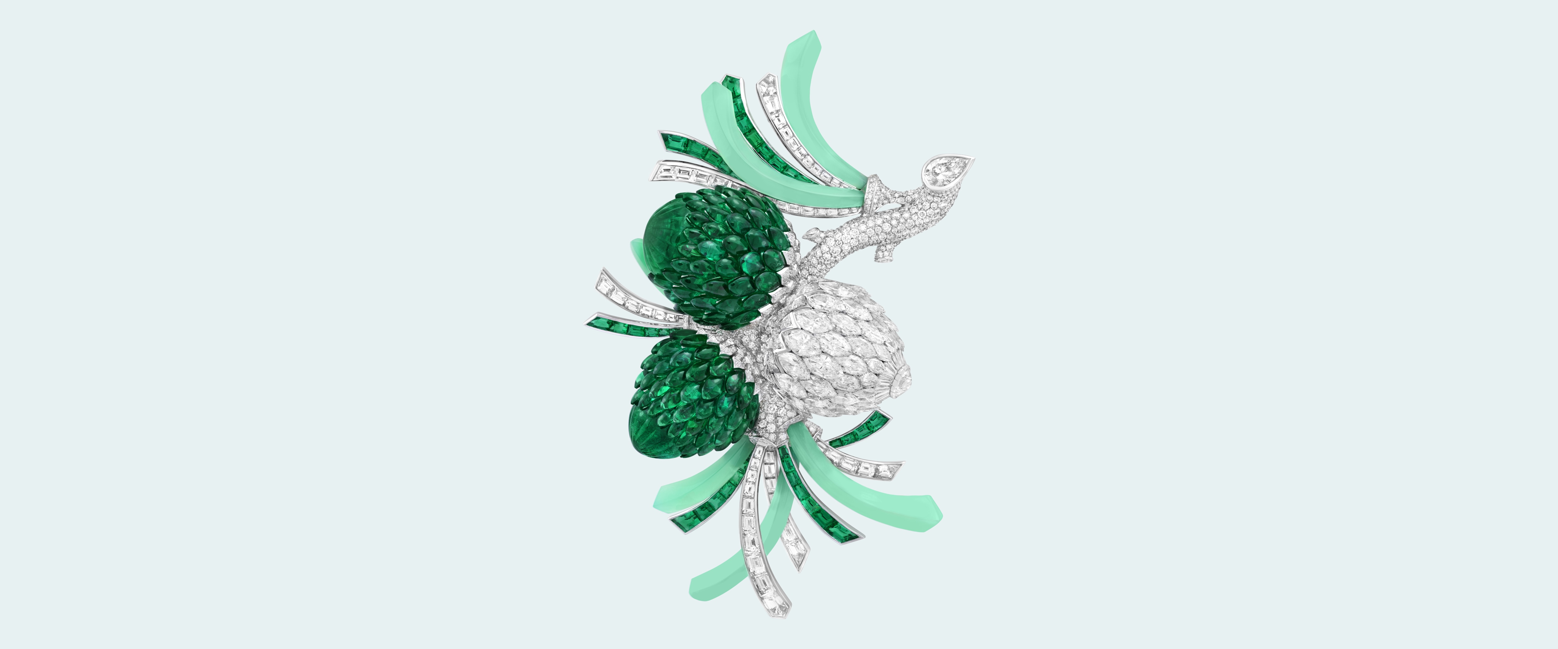 Pomme de Pin clip, white gold, rose gold, buff-topped Navette Mystery Set emeralds, Navette Mystery Set diamonds, emeralds, chrysoprase, diamonds. Collection, Van Cleef et Arpels. Quatres contes de Grimm collection, Van Cleef & Arpels.