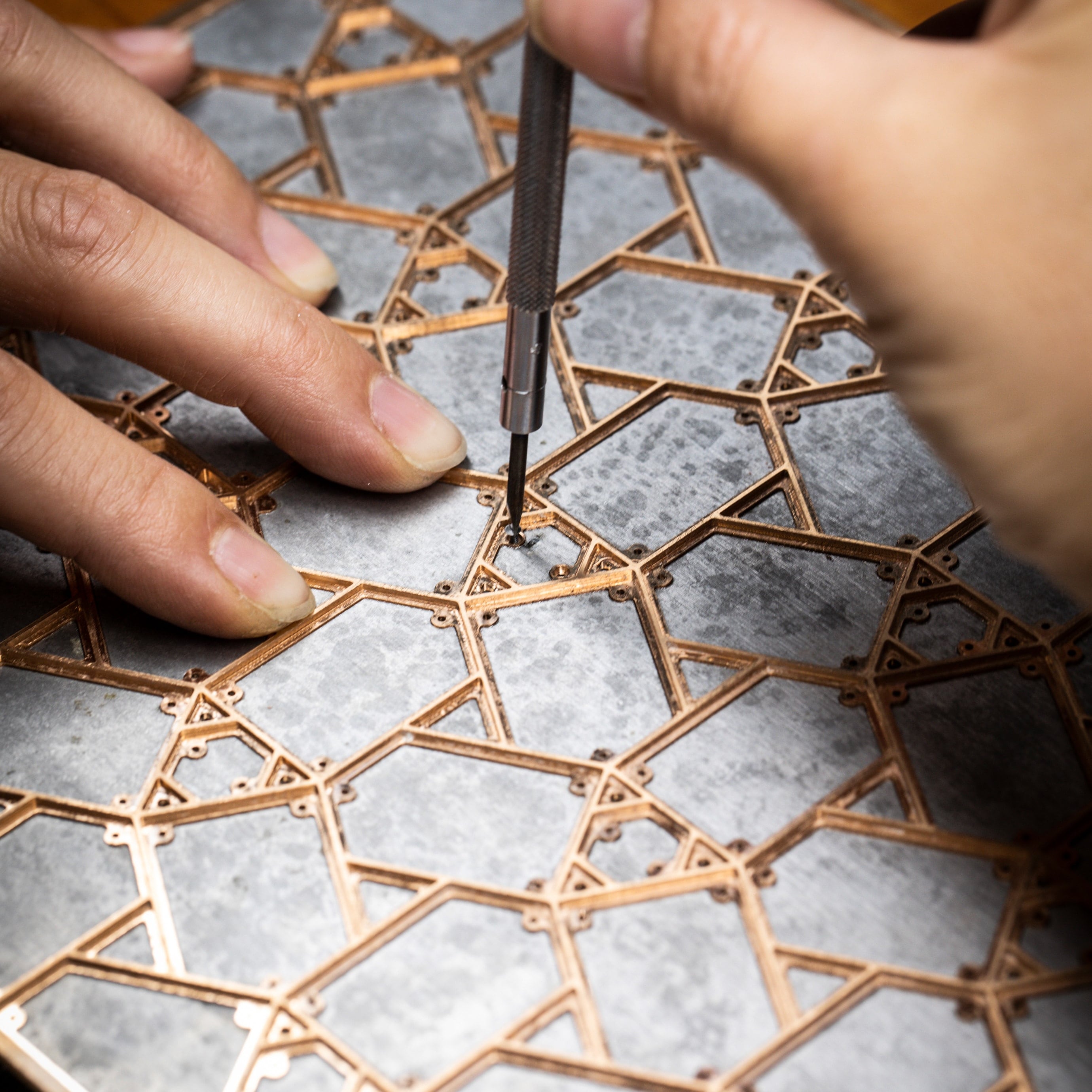 Assembling the gold structure and the aluminum structure. Precious boxes, Van Cleef & Arpels.