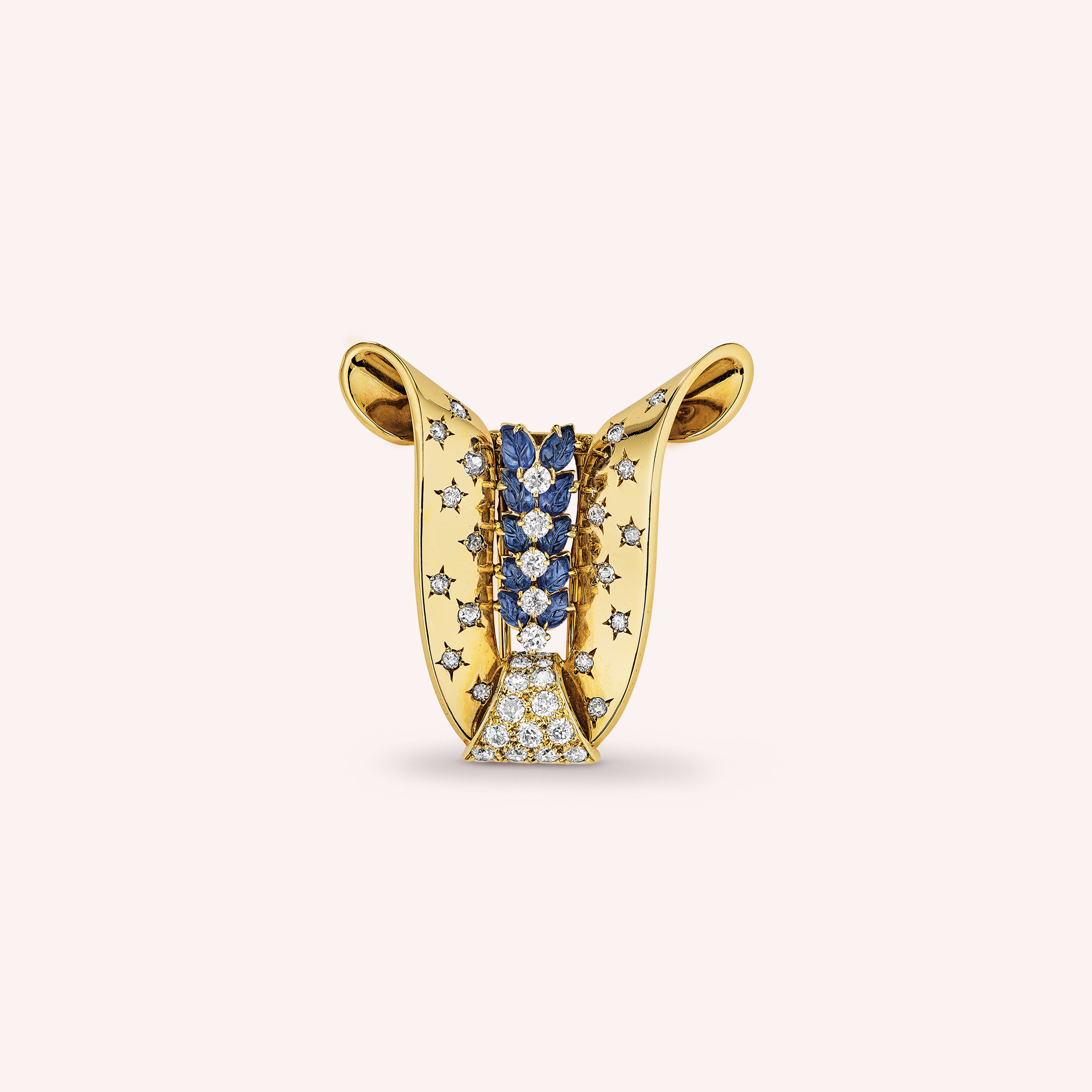 胸针，1942年，黄K金，白K金，蓝宝石，钻石。Van Cleef & Arpels梵克雅宝典藏。