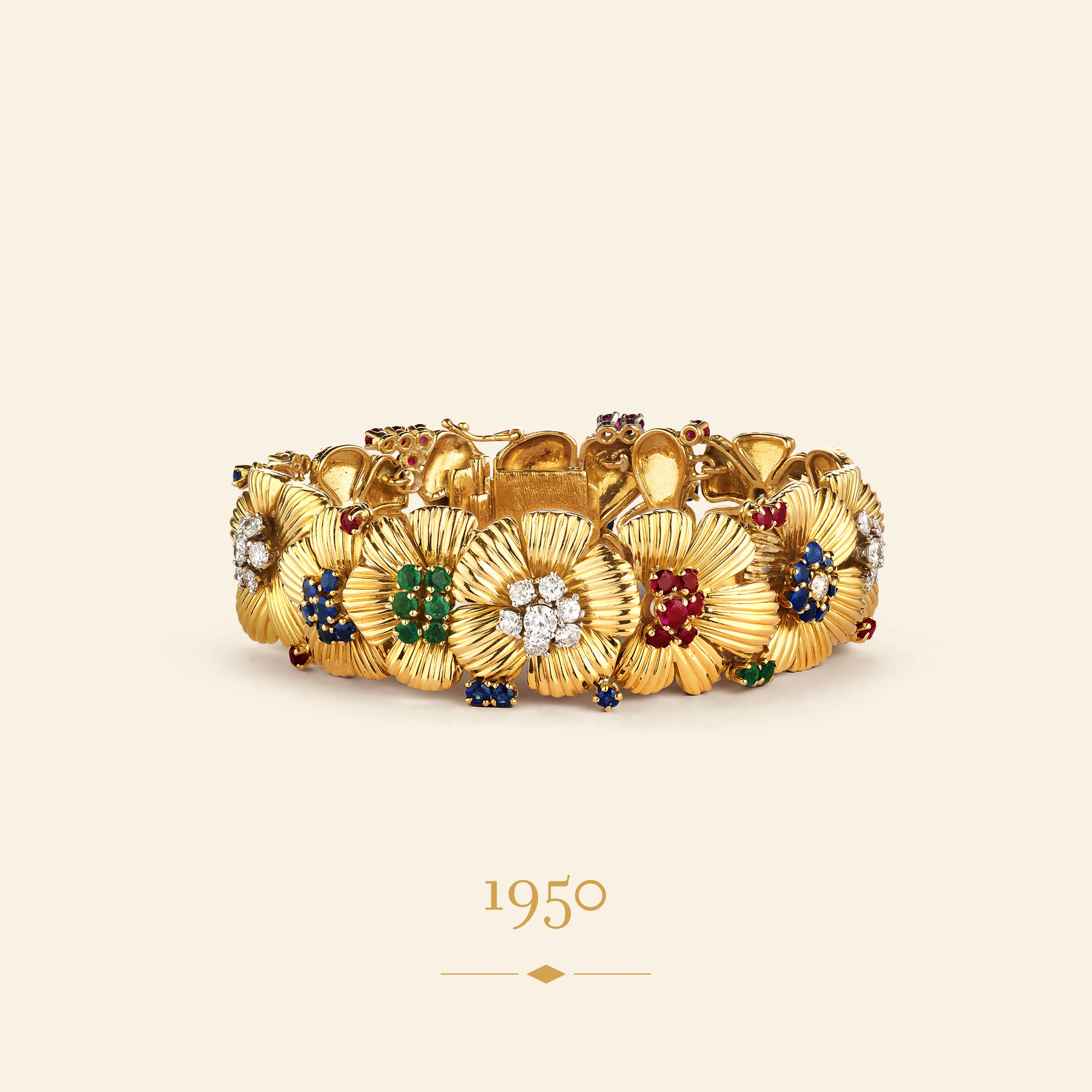 Little Flower手镯，1950年。黄K金，祖母绿，红宝石，蓝宝石，钻石。Van Cleef & Arpels梵克雅宝典藏。