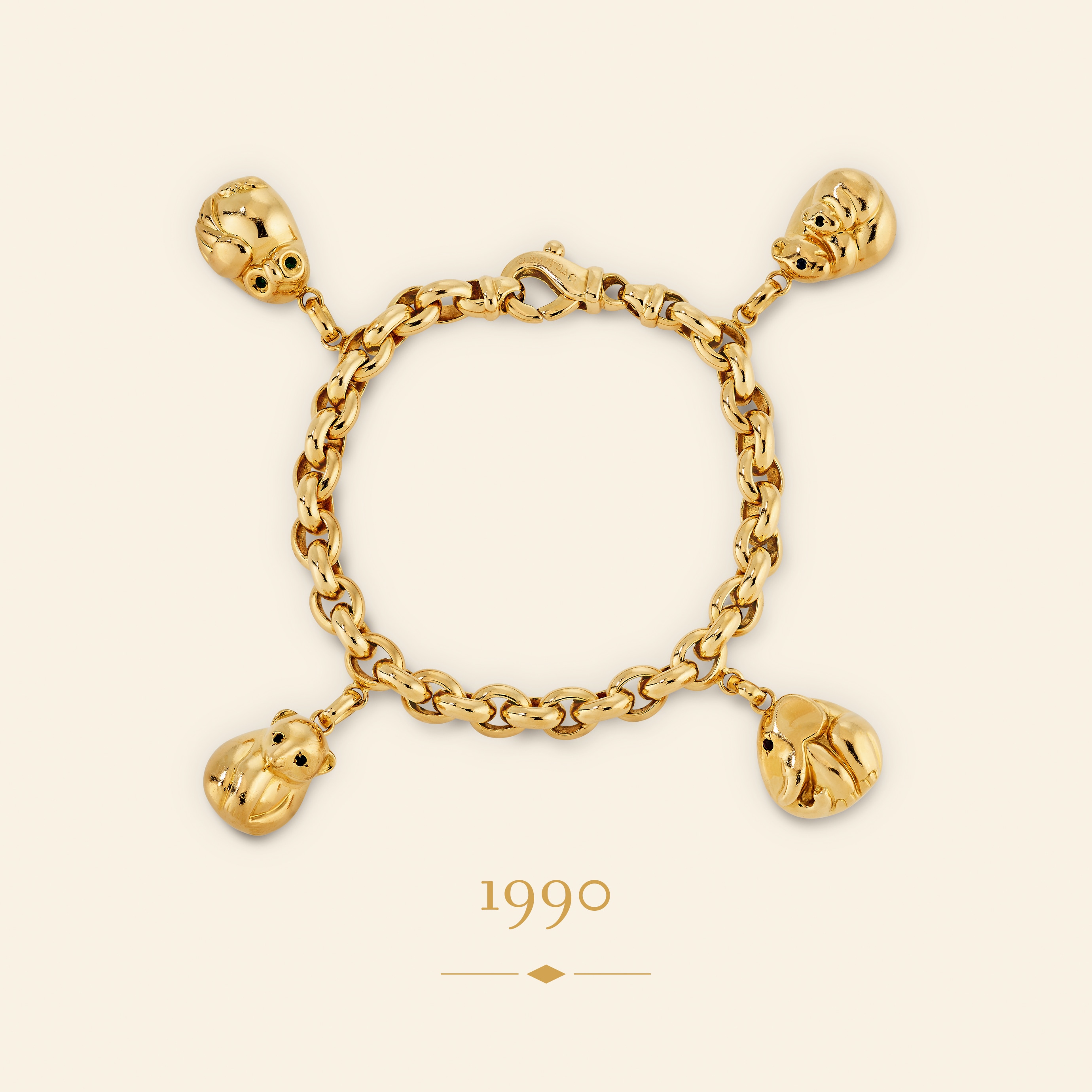 Jungle手镯，约1990年。黄K金，祖母绿，红宝石，蓝宝石。Van Cleef & Arpels梵克雅宝典藏。
