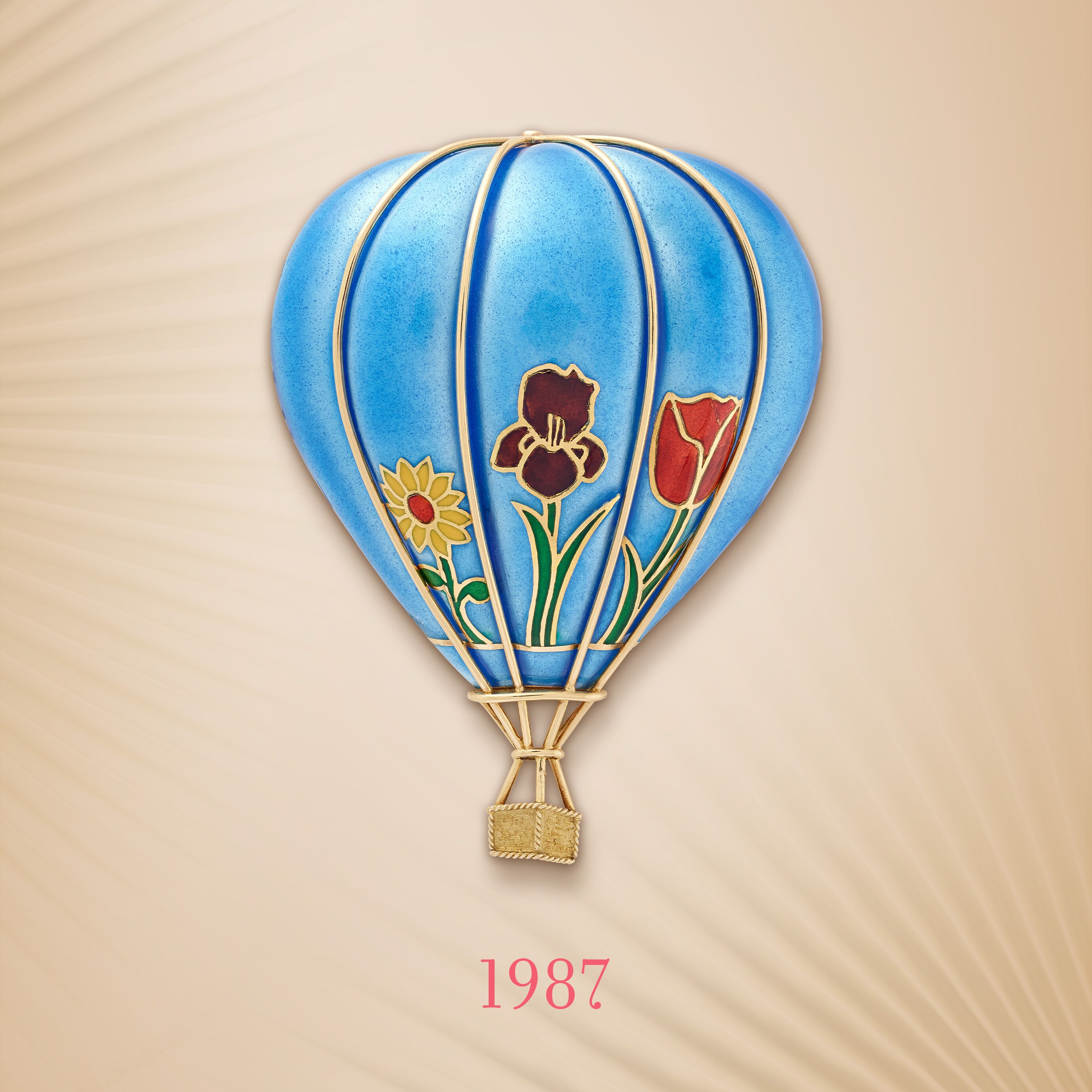 Balloon胸针，1987年。黄K金，白K金，珐琅。Van Cleef & Arpels梵克雅宝典藏系列。