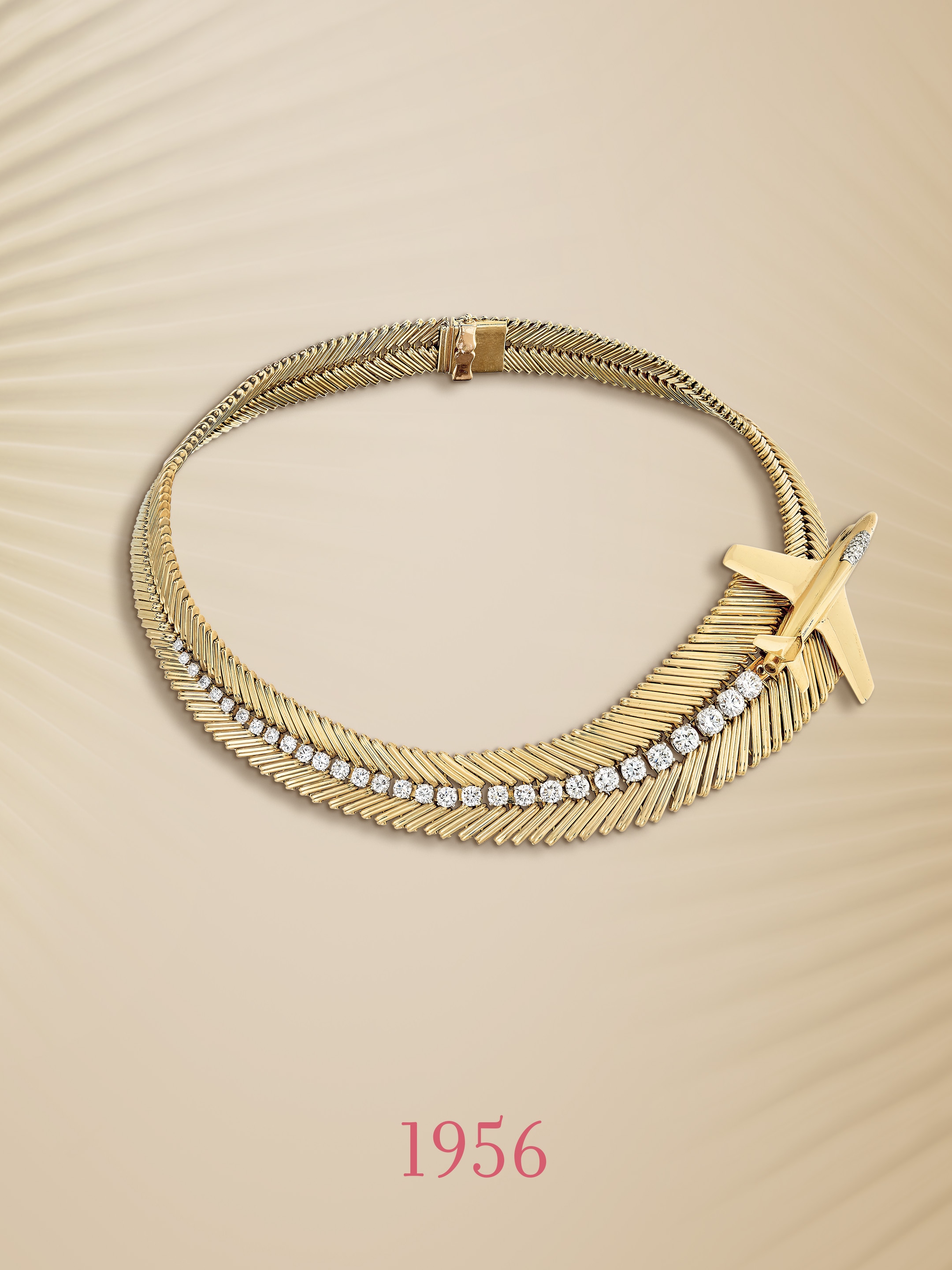 Mystère IV plane necklace, 1956. Platinum, 18K yellow gold, diamonds. Van Cleef & Arpels Collection.