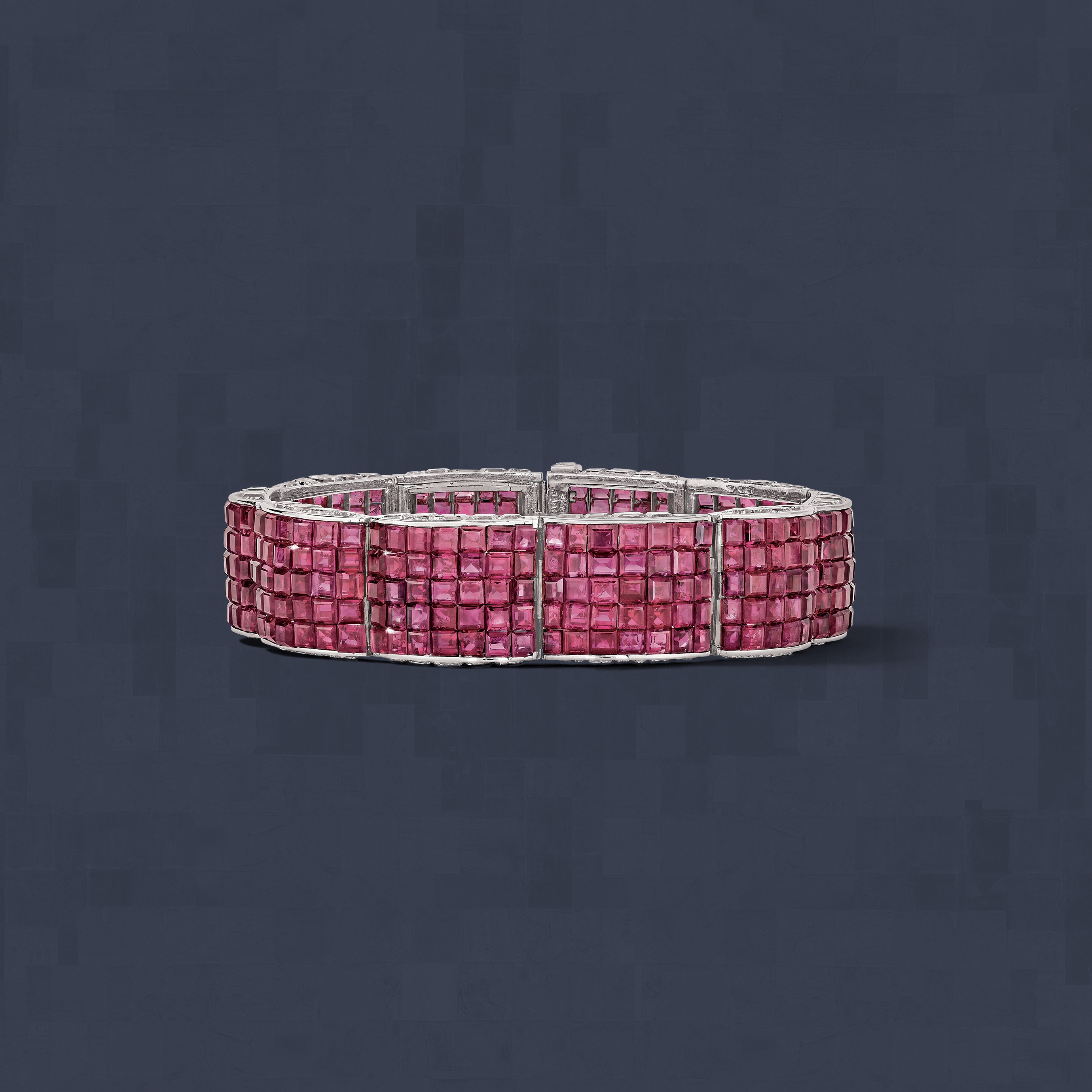 Bracelet, 1936. Platinum, yellow gold, Mystery set™ rubies, diamonds. Van Cleef & Arpels Collection.