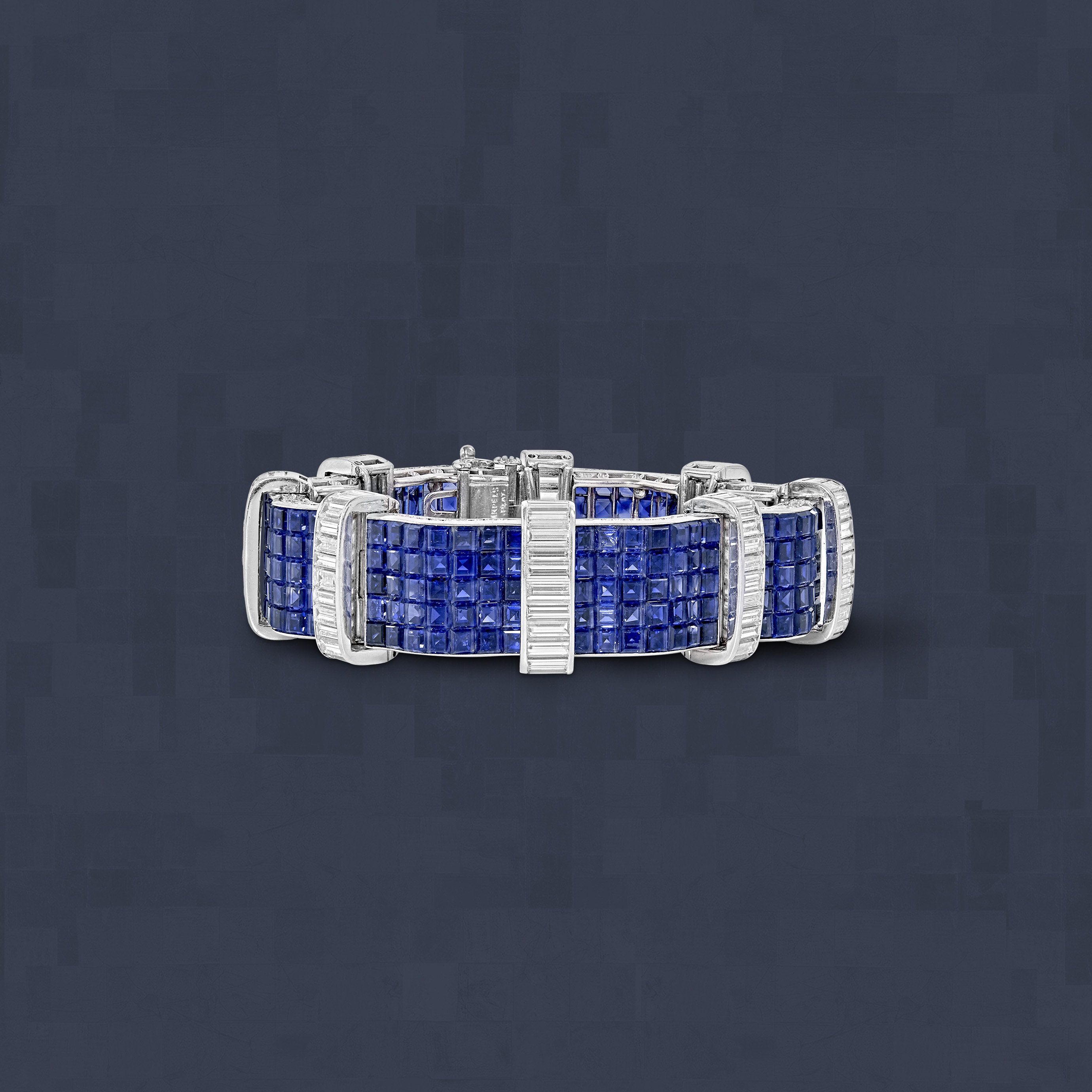 Bracelet, 1948. Platinum, white gold, Mystery Set™ sapphires, diamonds. Van Cleef & Arpels Collection.
