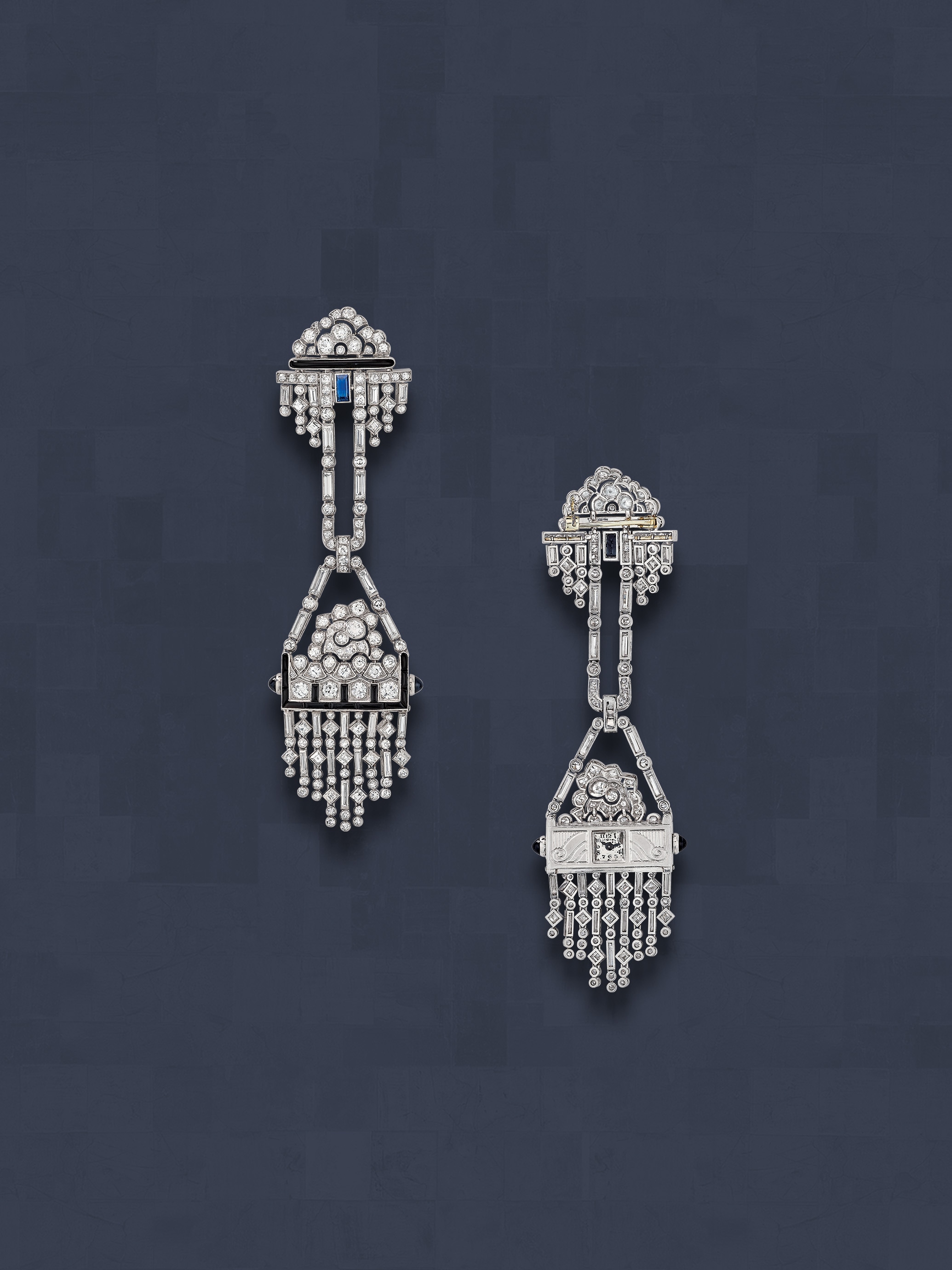 Lapel watch, 1926. Platinum, white gold, sapphires, onyx, diamonds.Van Cleef & Arpels Collection.