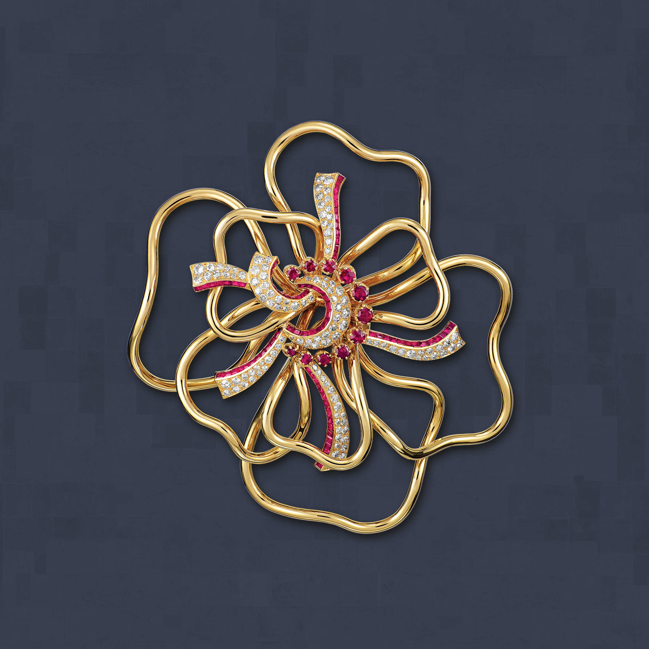 Silhouette Flower clip, 1937. Yellow gold, white gold, rubies, diamonds. Van Cleef & Arpels Collection.