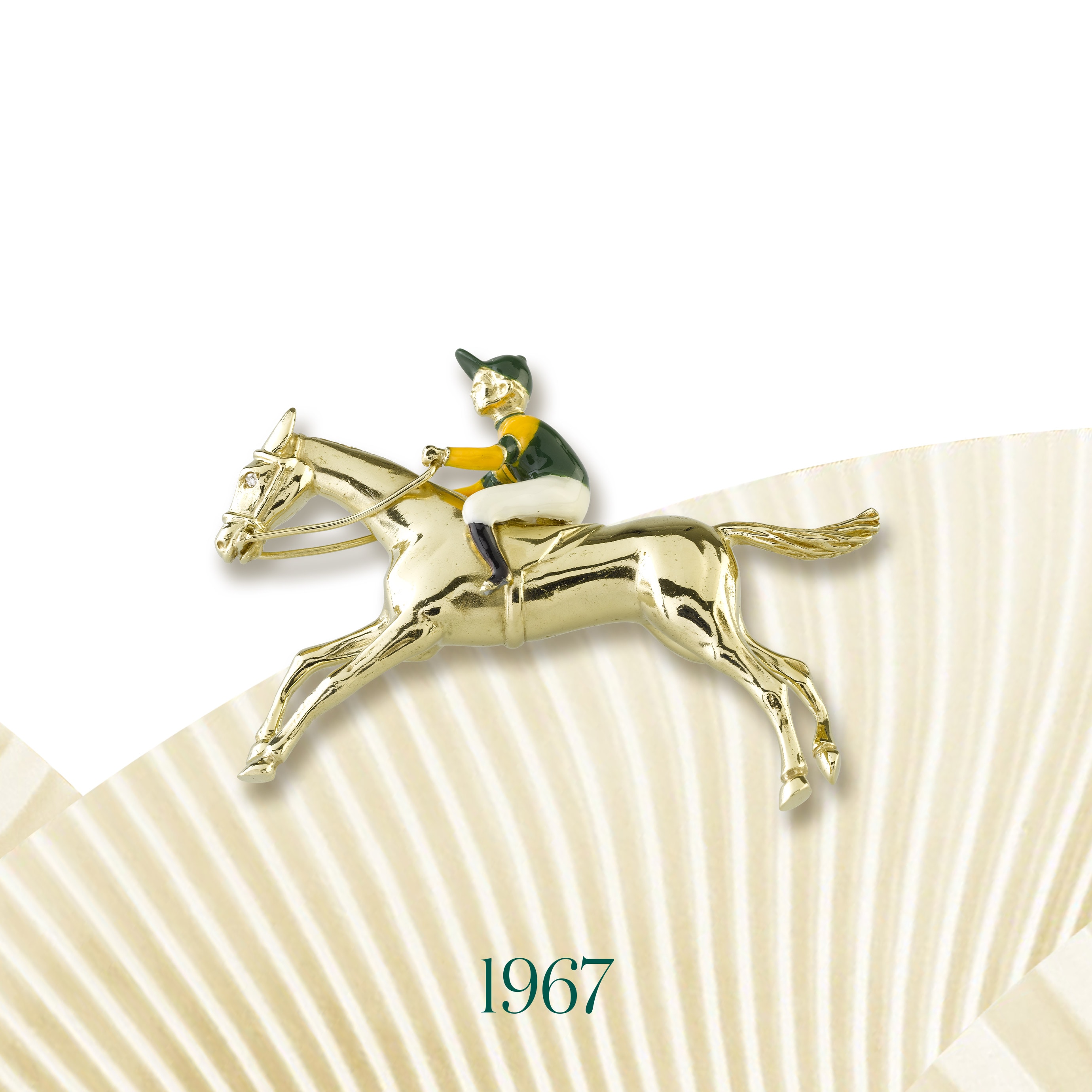 Jockey clip, 1967. Yellow gold, enamel. Van Cleef & Arpels Collection.