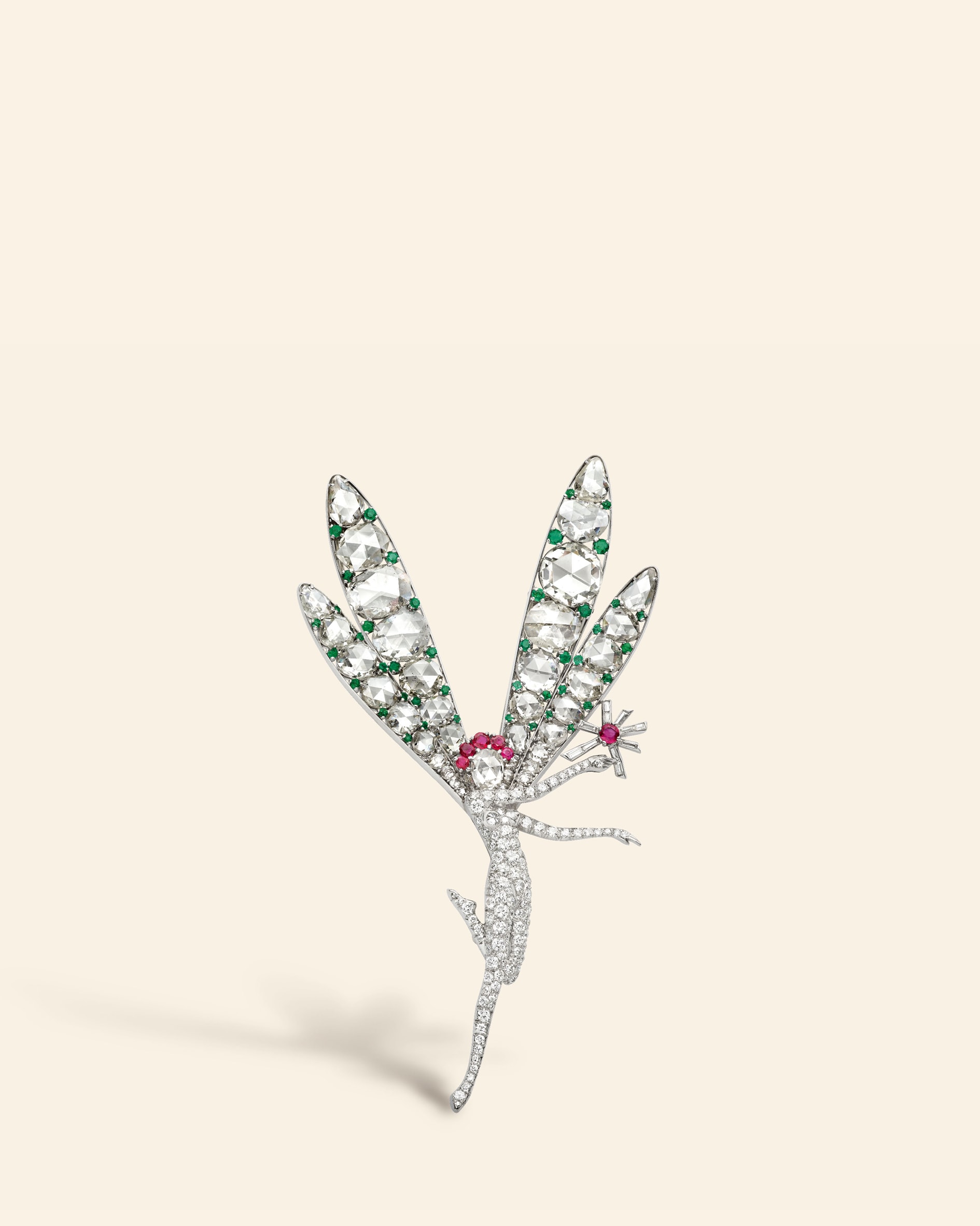 Little Winged Fairy clip, later named Spirit of Beauty, 1941​. Platinum, emeralds, rubies, diamonds​. Van Cleef & Arpels Collection​.