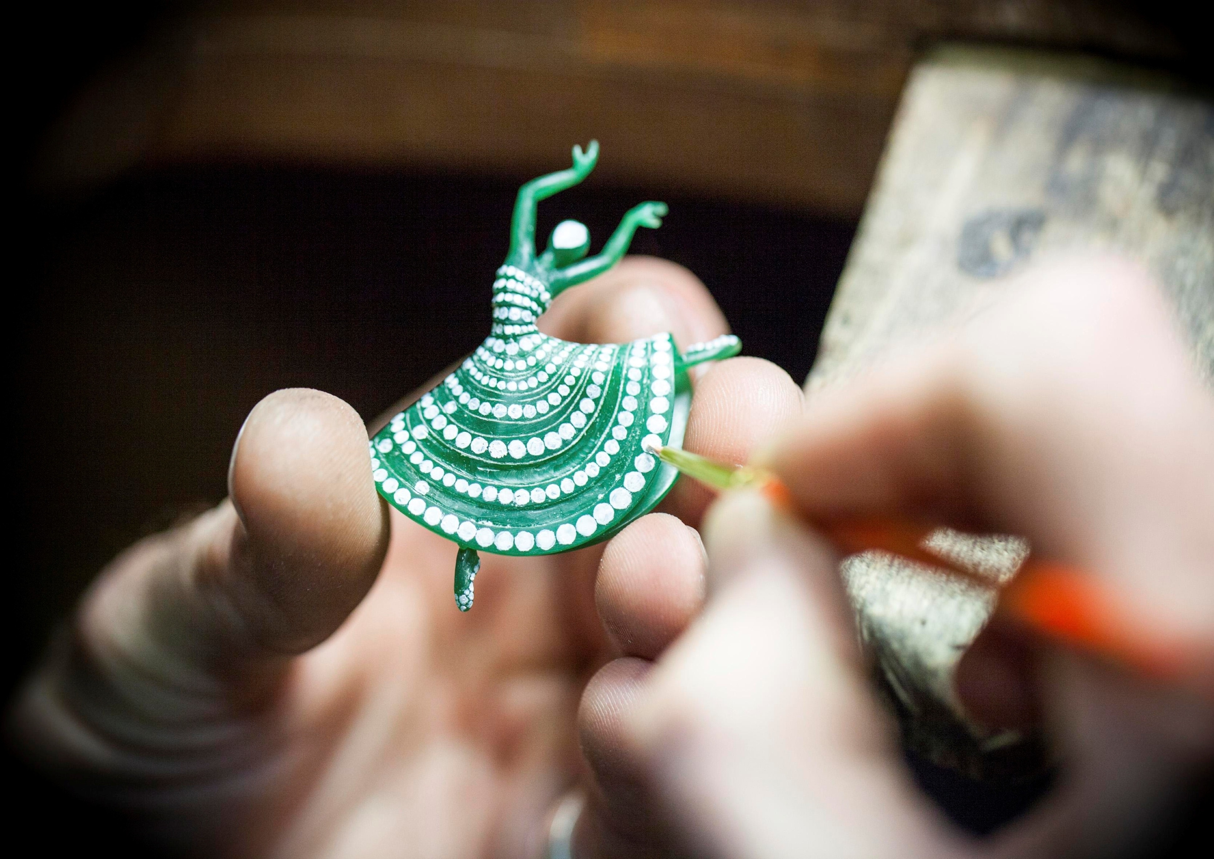 Marking the diamond placement on a wax ballerina, 2013. Van Cleef & Arpels.