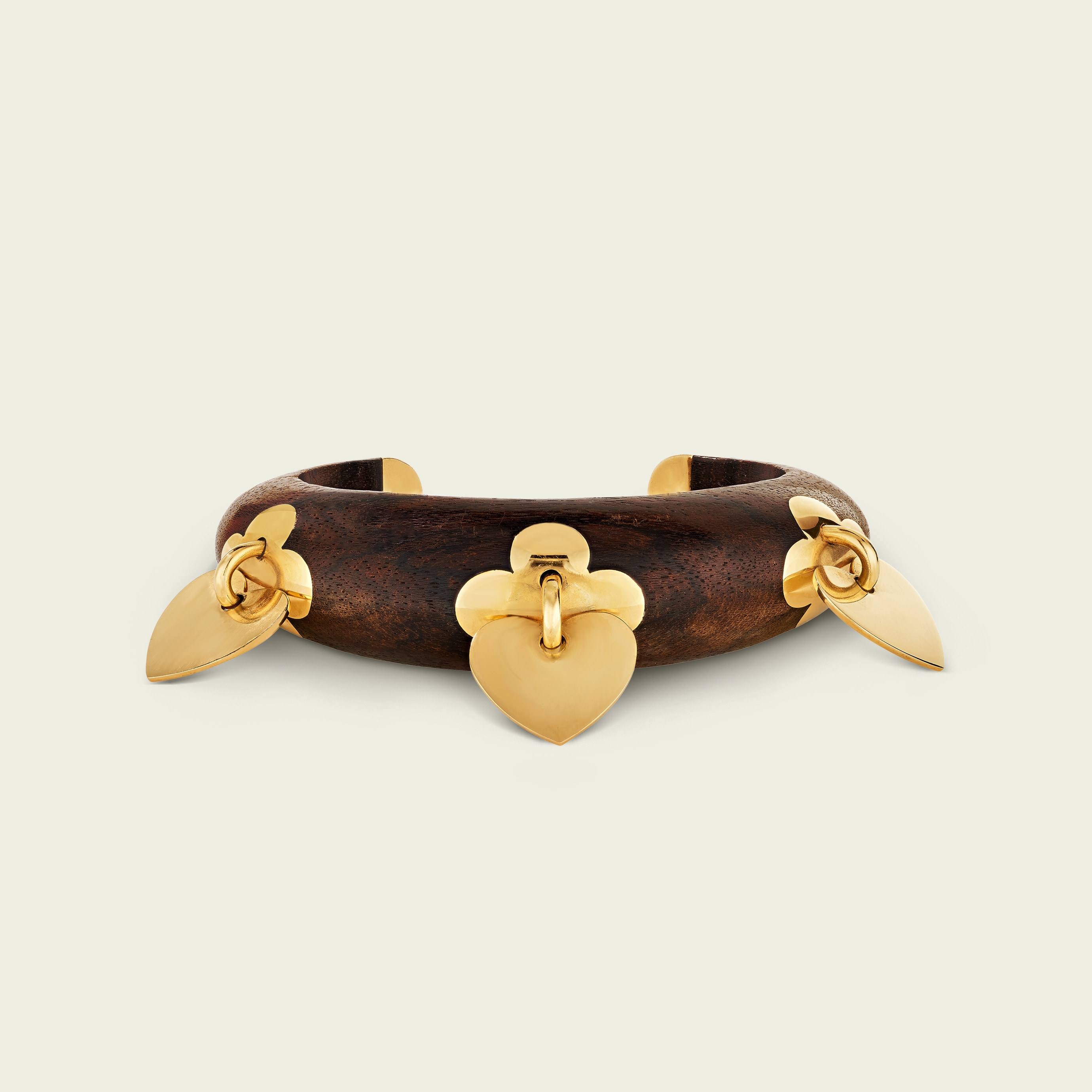 Sylvestre bracelet, circa 1997. Yellow gold, wood. Van Cleef & Arpels Collection.