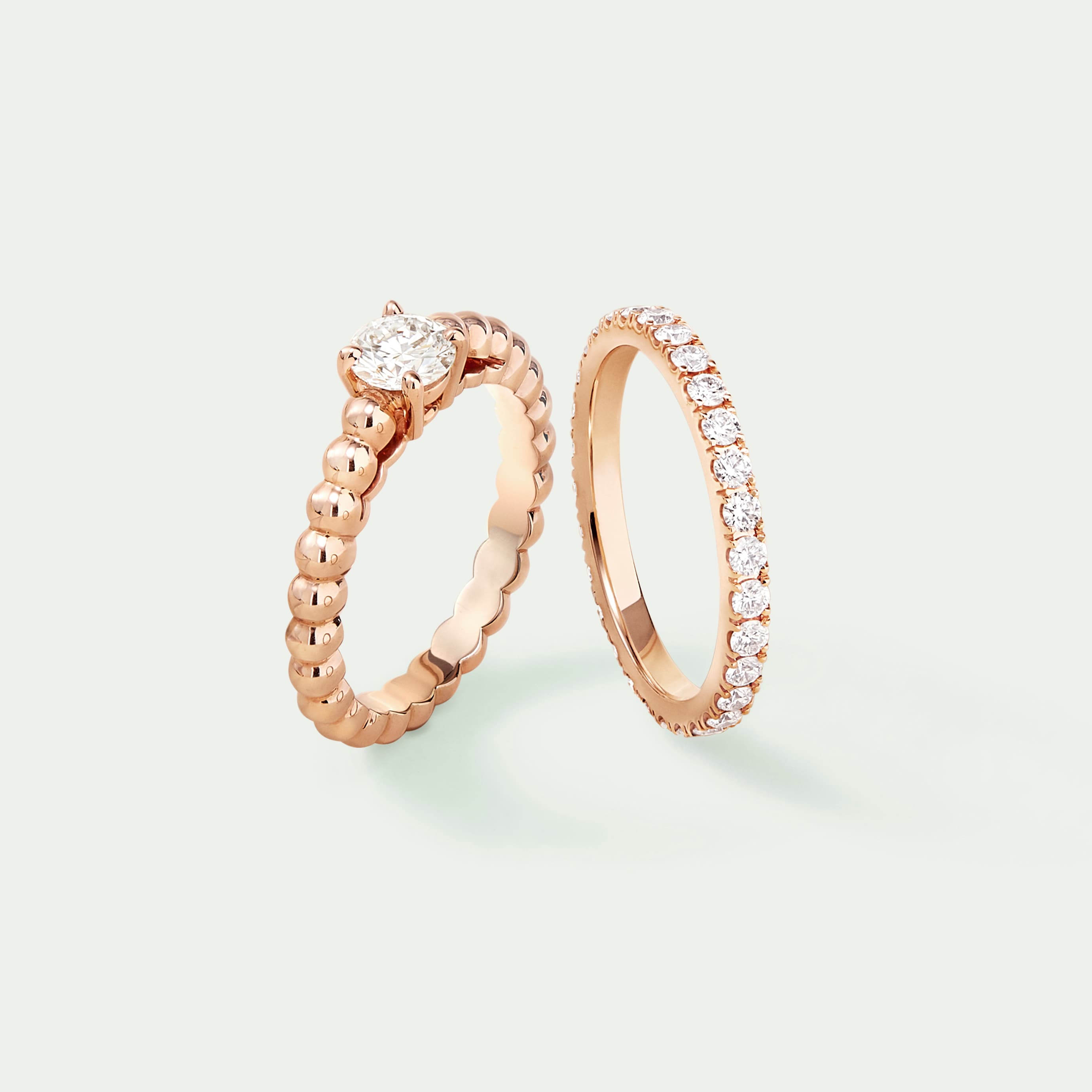 Perlée solitaire, 18K rose gold, one round 1.00 carat DIF diamond, Félicité wedding band 2.1 mm, 18K rose gold, round diamonds. Perlée and Wedding bands collections, Van Cleef & Arpels.
