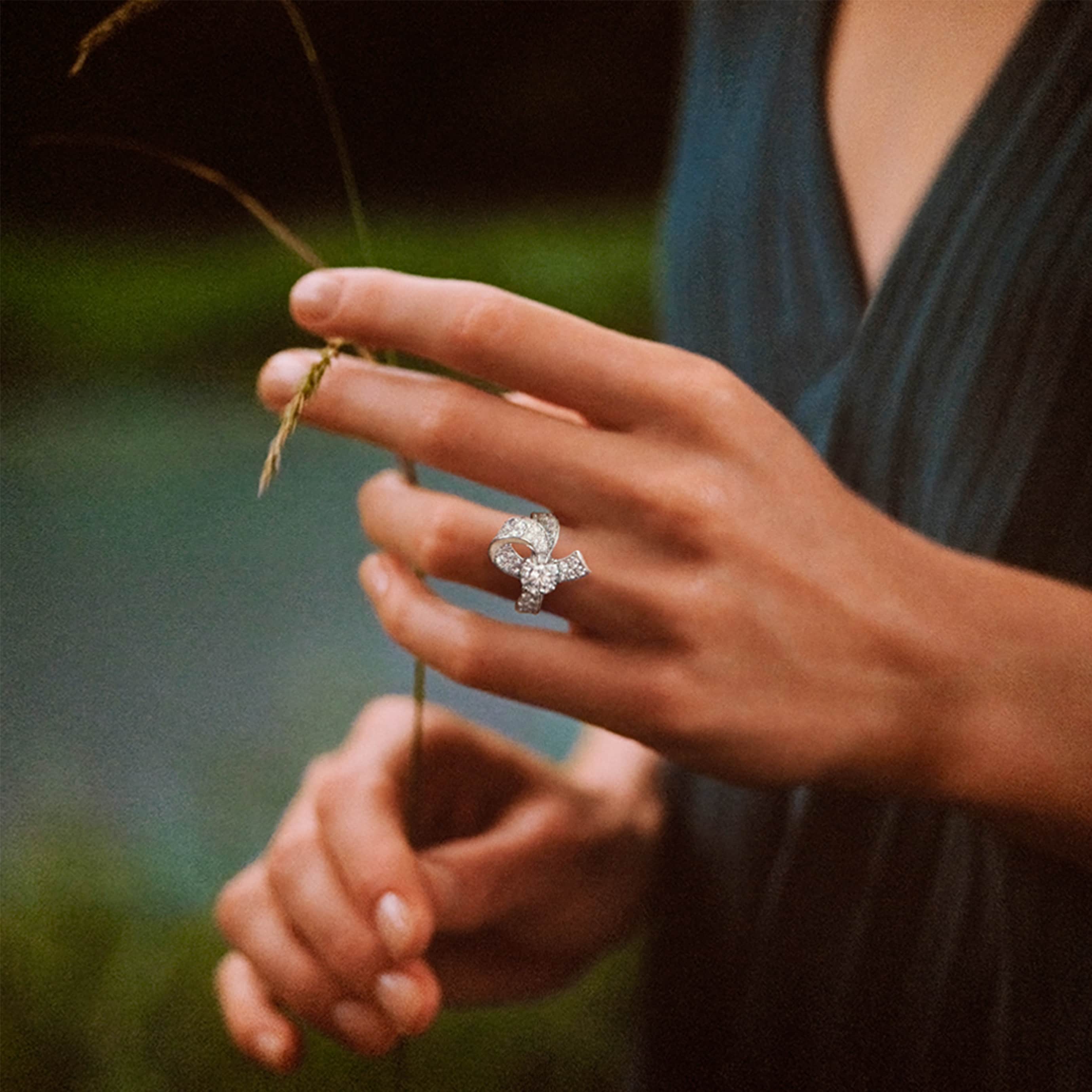Boucle solitaire, platinum, diamonds, one round diamond between 1.26-1.50 carats. Solitaires collection, Van Cleef & Arpels.
