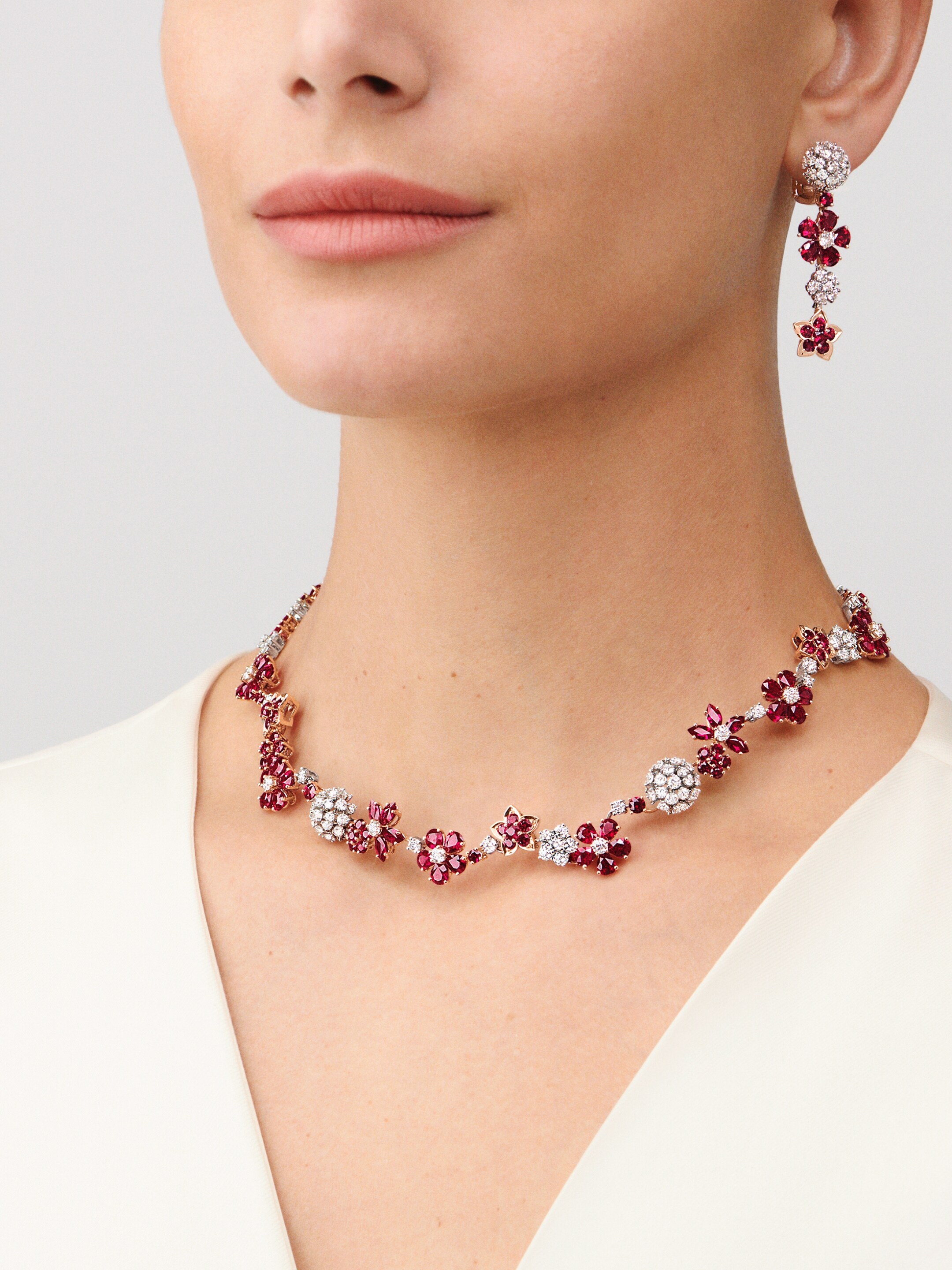 Folie des Prés necklace and earrings, 18K white gold, 18K rose gold, rubies, diamonds. Folie des Prés High Jewelry collection, Van Cleef & Arpels.