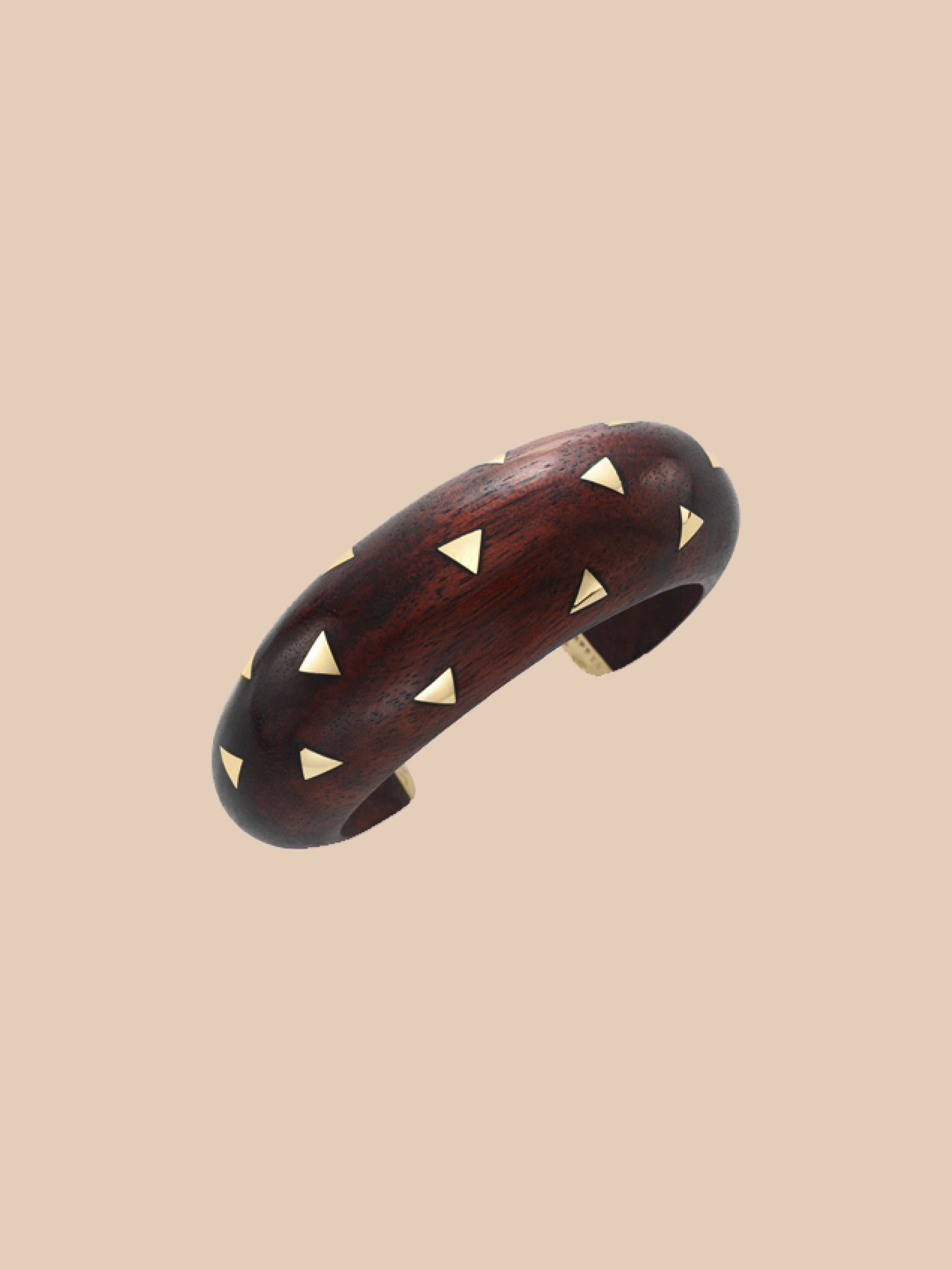 Bracelet, circa 1994, yellow gold, wood. Heritage collection, Van Cleef & Arpels.