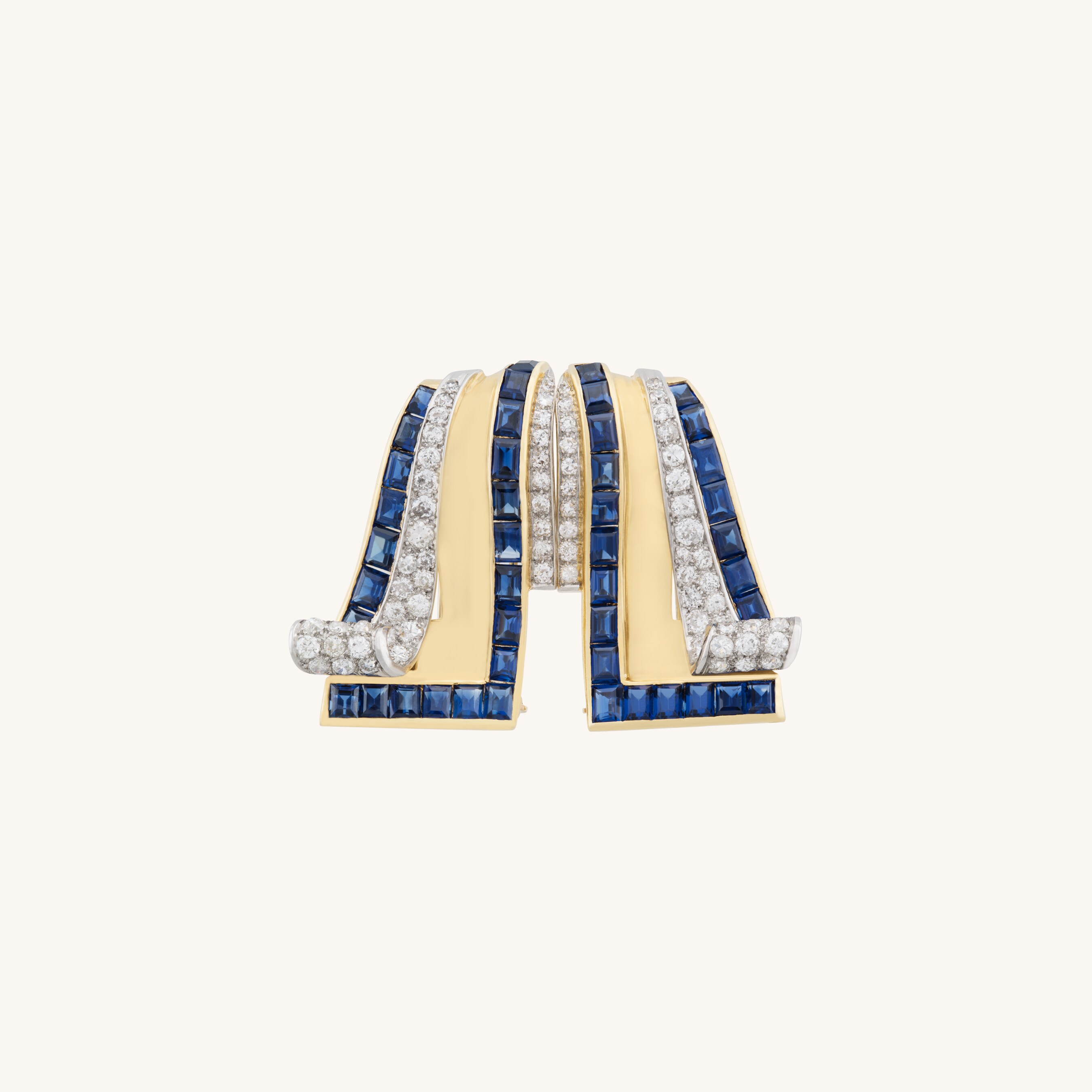 Ruban胸针,1941年,黄K金,铂金,白K金,蓝宝石,钻石。Heritage系列,封面图片,Van Cleef & 梵克雅宝。
