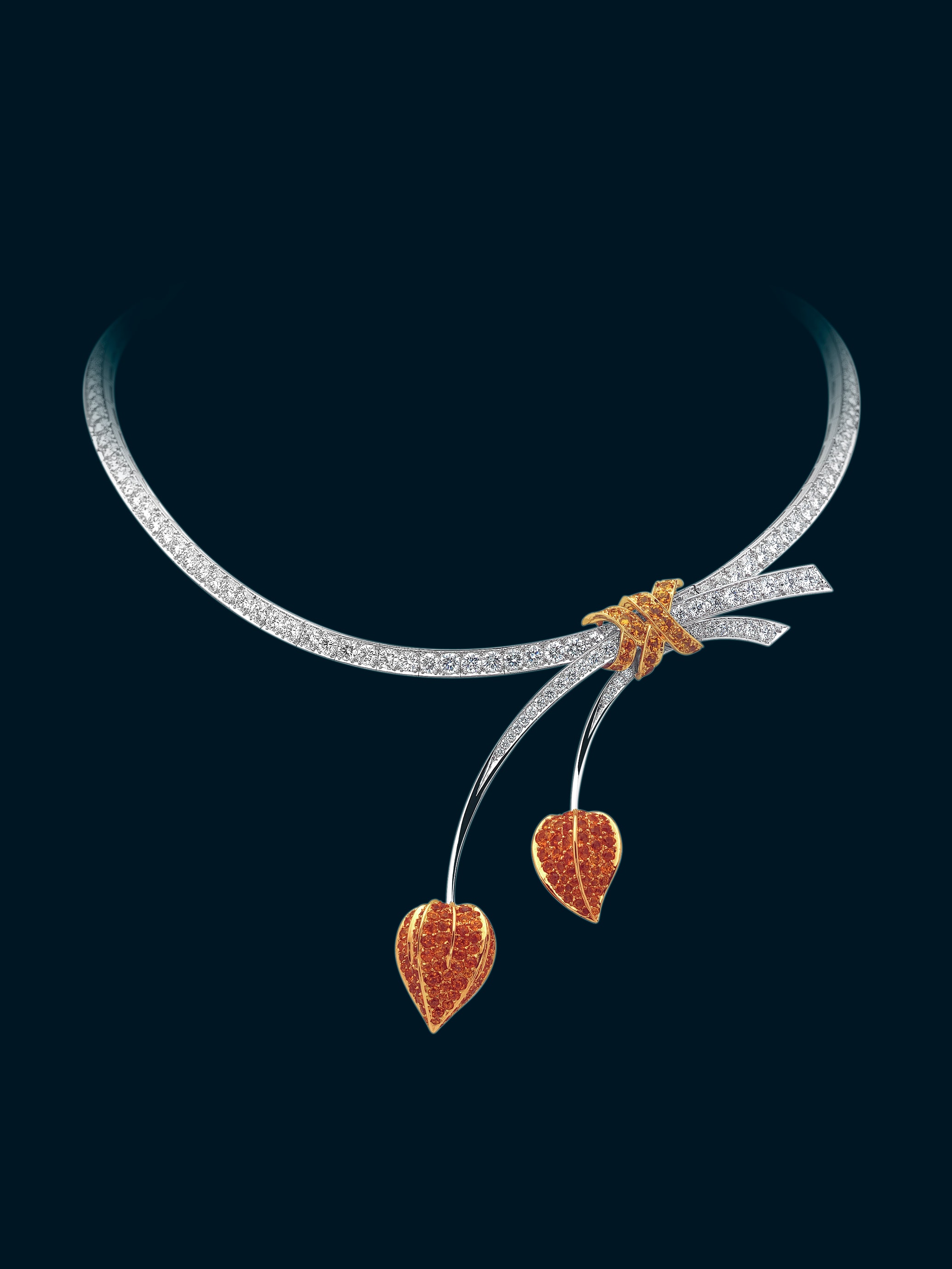 Amour en cage项链及可拆卸式胸针。18K白金,黄K金,黄色蓝宝石,锰铝石榴石,钻石。私人珍藏。