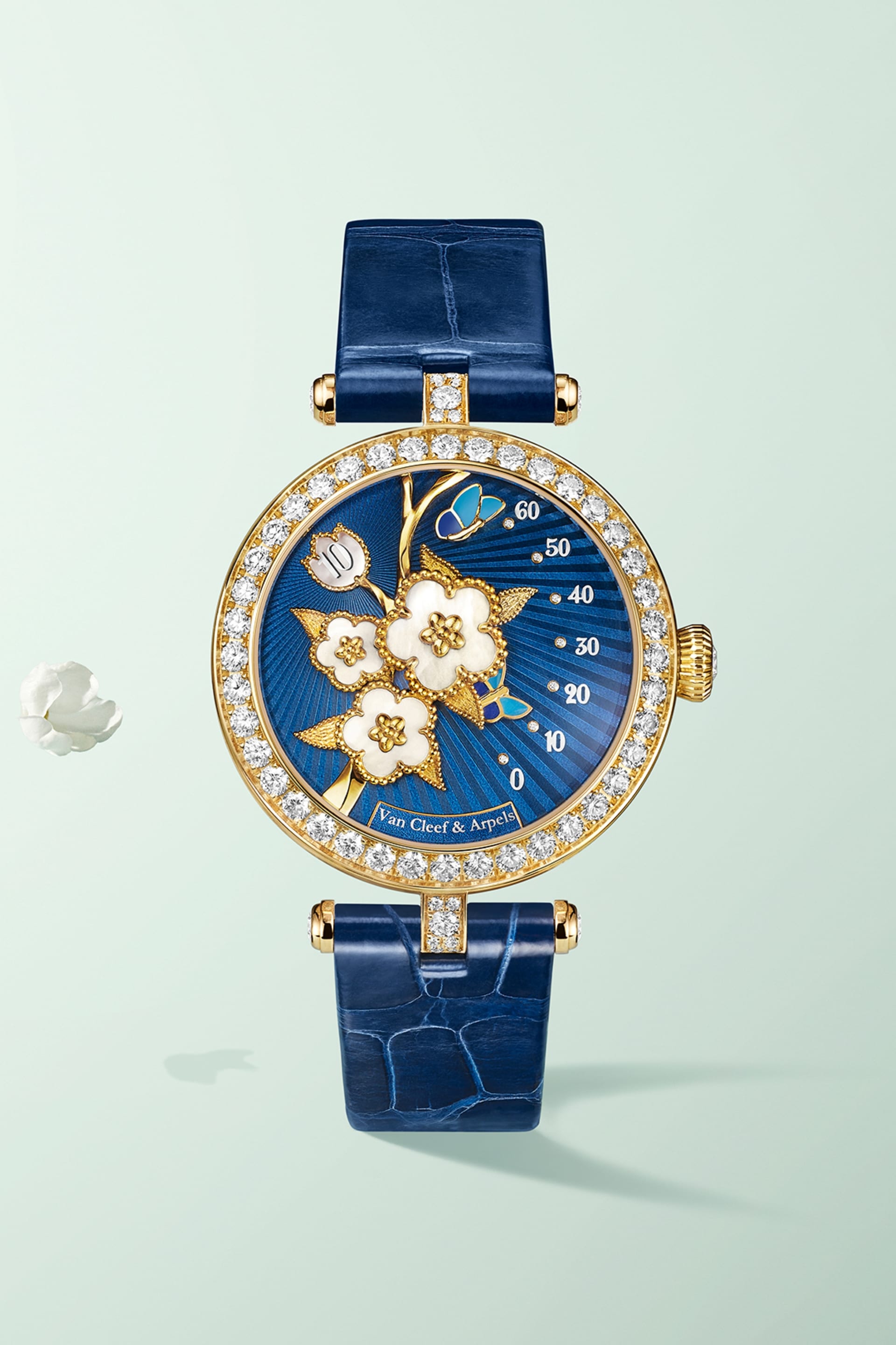 Lady Lucky Spring butterfly腕表，黄K金，珐琅，白色珍珠母贝，钻石，自动上链机械机芯，搭载逆跳分钟与跳时功能。 Poetic Complications®诗意复杂功能腕表系列，Van Cleef & Arpels梵克雅宝。