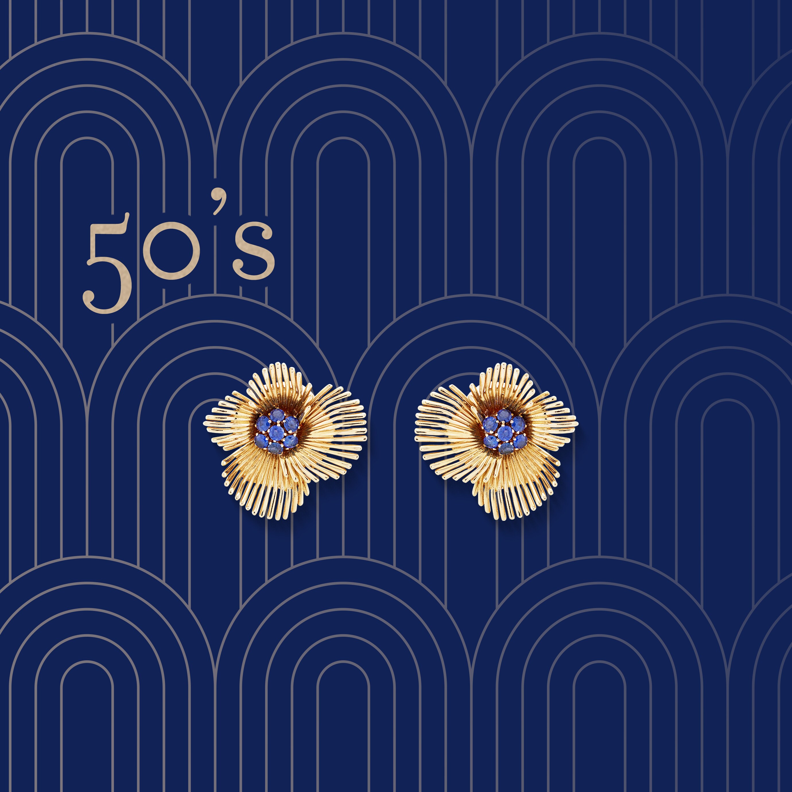 Earrings representing flowers in yellow gold and sapphires, 1950's. Van Cleef & Arpels