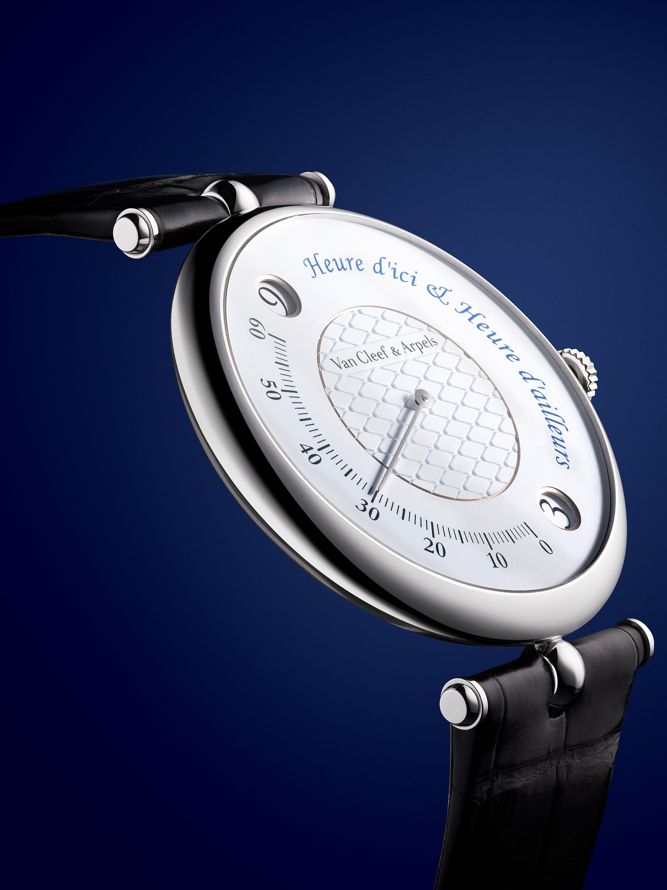 Pierre Arpels Heure d’Ici & Heure d’Ailleurs watch, rhodium plated 18K white gold, diamond, lacquer, self-winding mechanical movement, dual time zone, jumping hours and retrograde minutes. Pierre Arpels collection, Van Cleef & Arpels