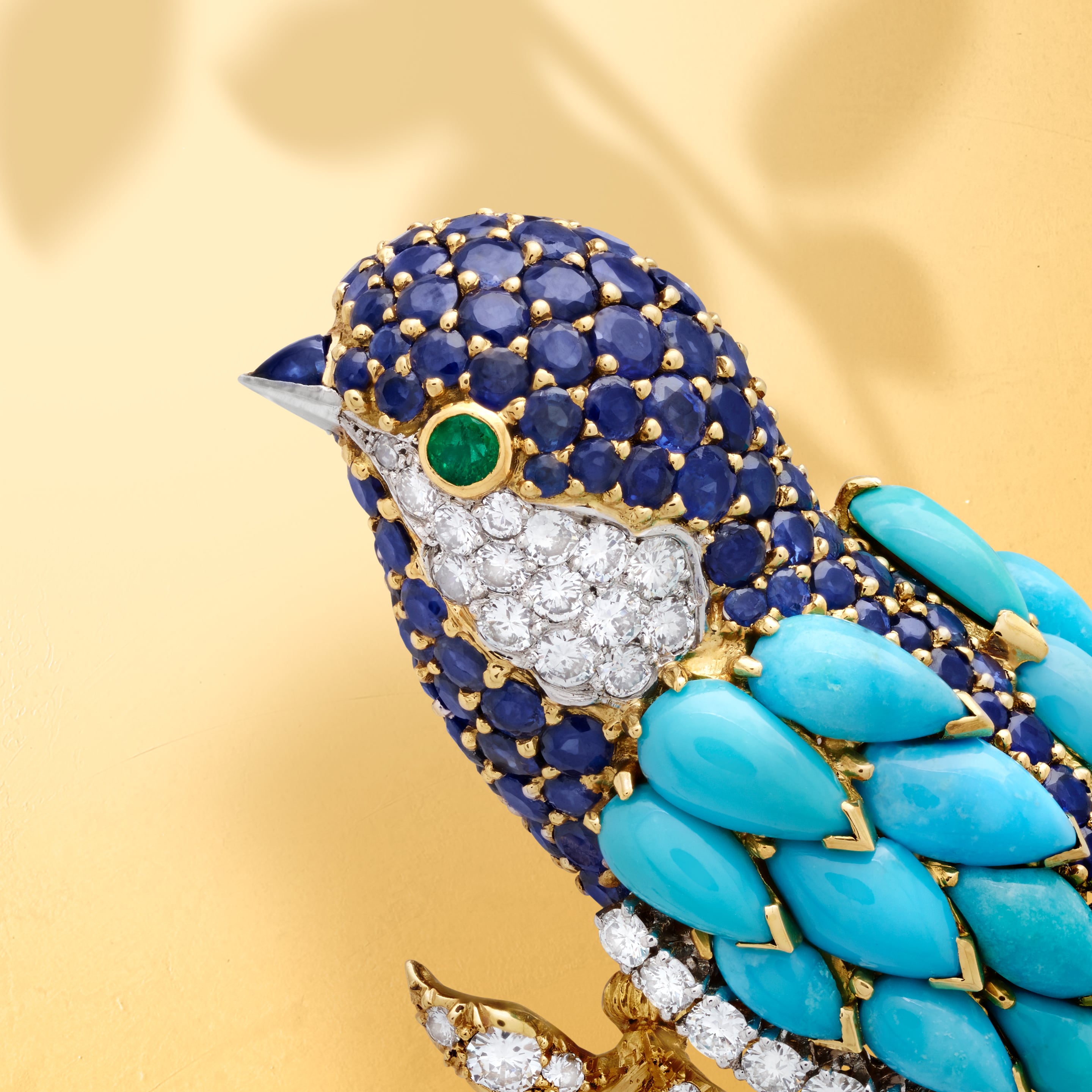 Mésange clip, 1962. Yellow gold, platinum, white gold, sapphires, emeralds, turquoise, diamonds. Heritage collection. Van Cleef & Arpels