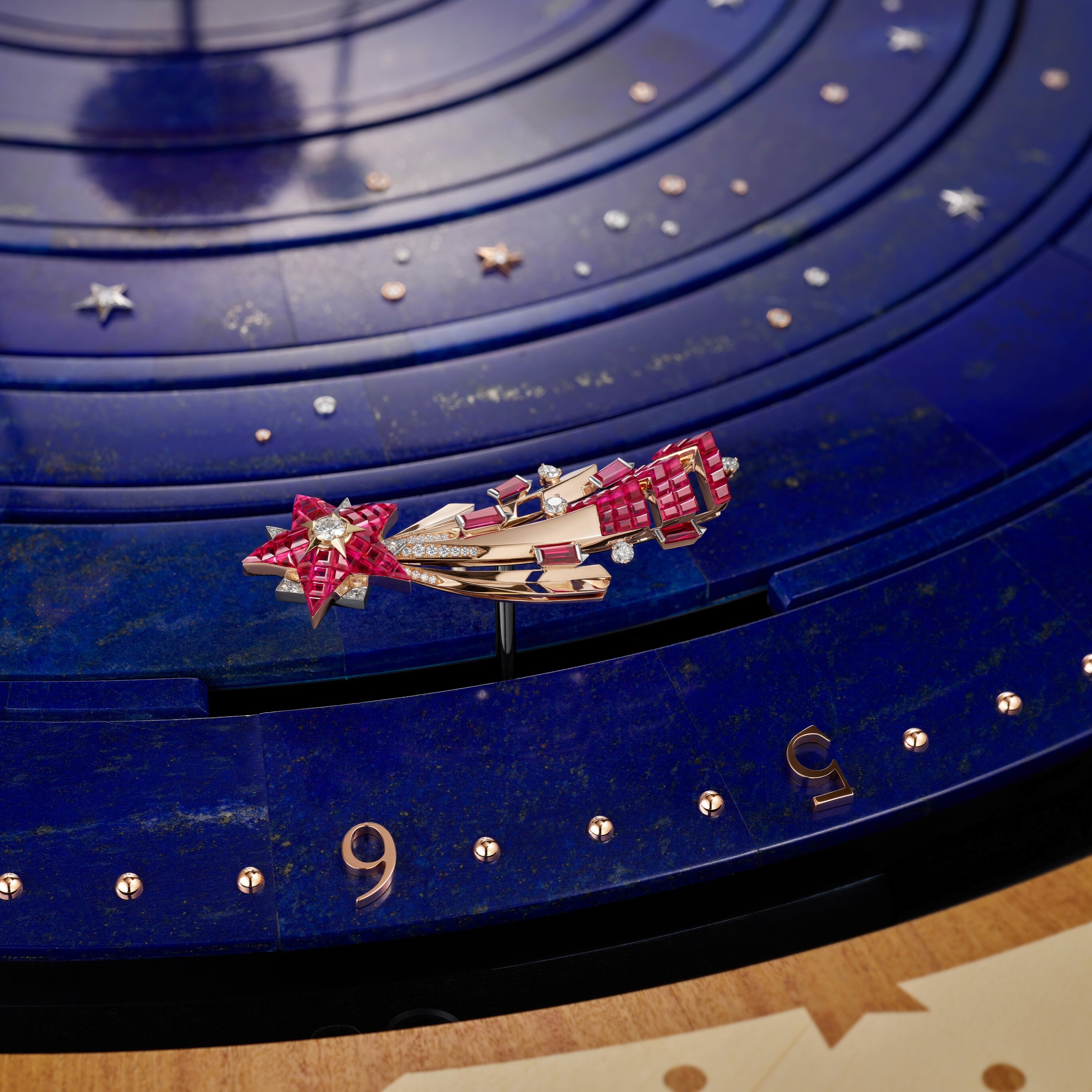 The shooting star in rose and white gold, Traditionnal Mystery Set™ rubies, rubis and diamonds, Van Cleef & Arpels.