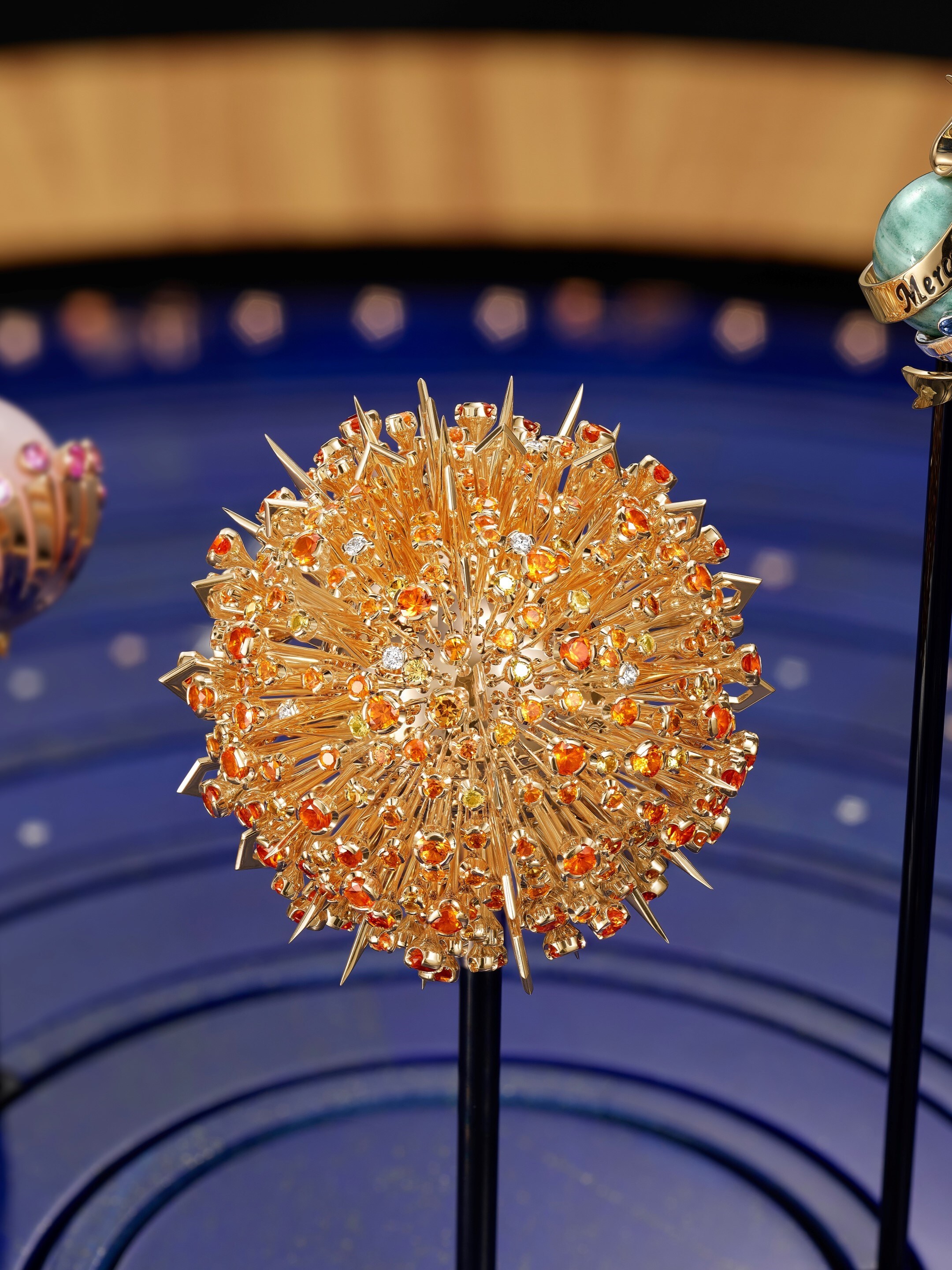 Sun in rose and yellow gold, yellow sapphires, spessartite garnets and diamonds, Van Cleef & Arpels.