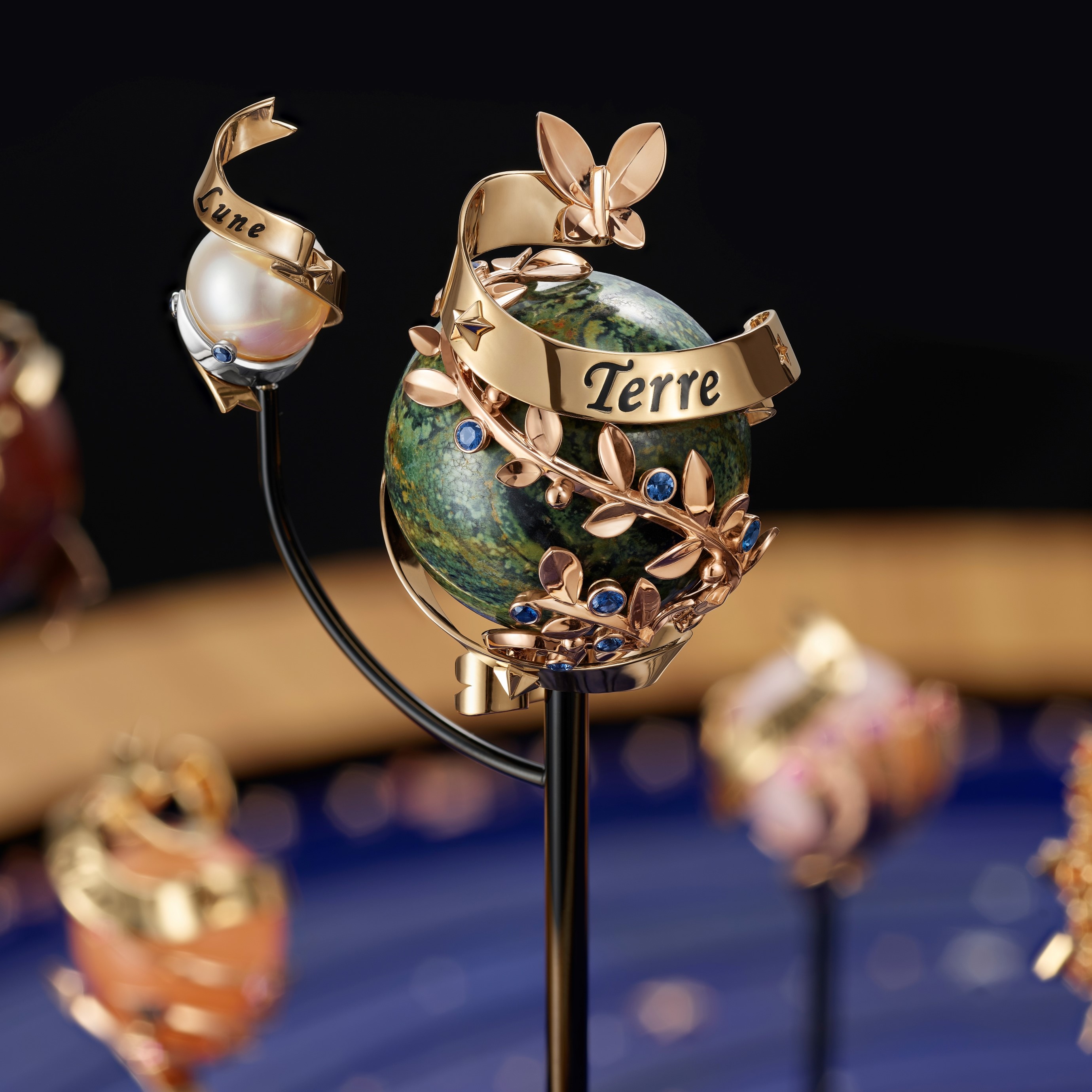 The Earth in rose and yellow gold, blue sapphires and jasper, Van Cleef & Arpels.