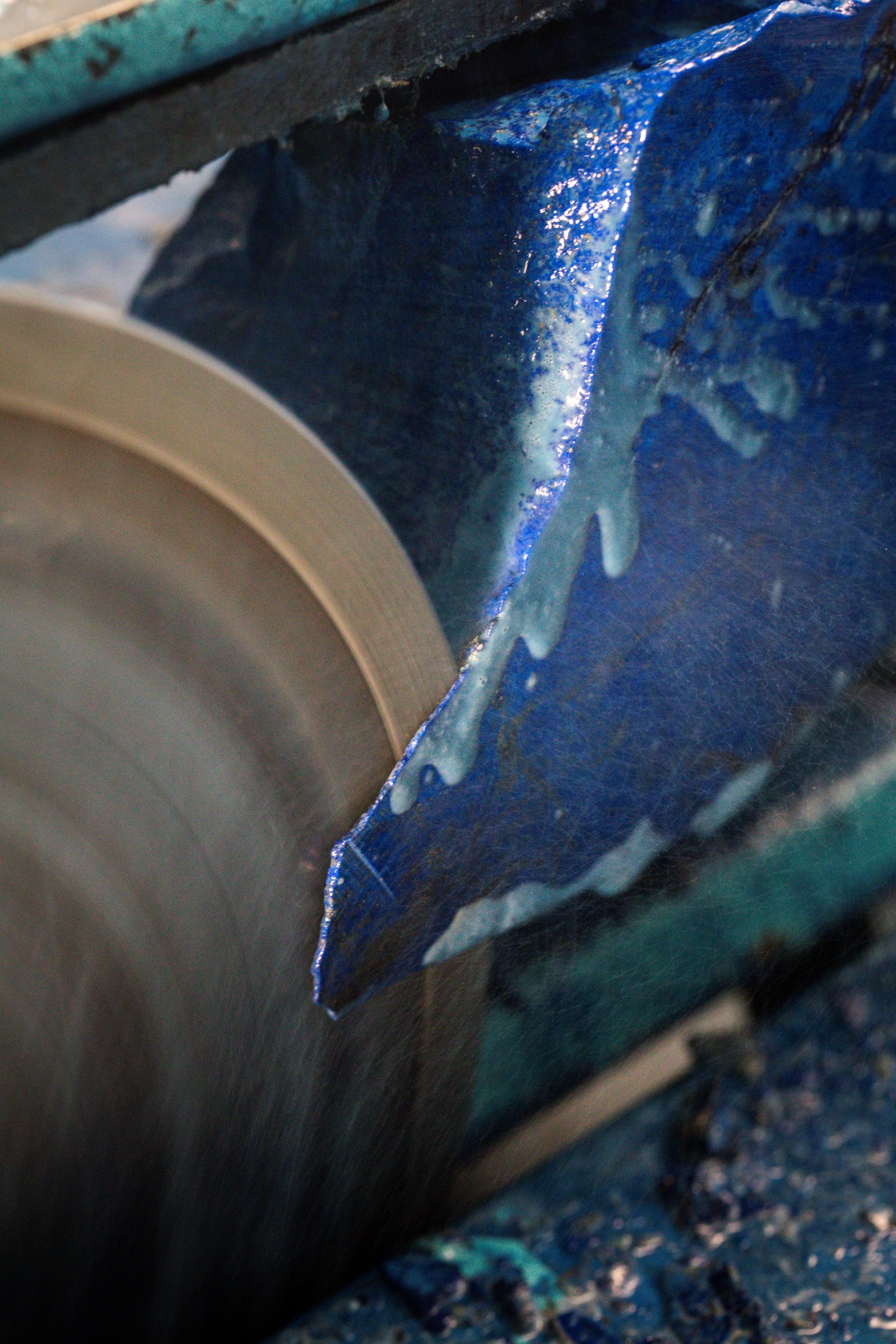 Pruning work, cutting the pre shapes out of the lapis lazuli stone, Van Cleef & Arpels.