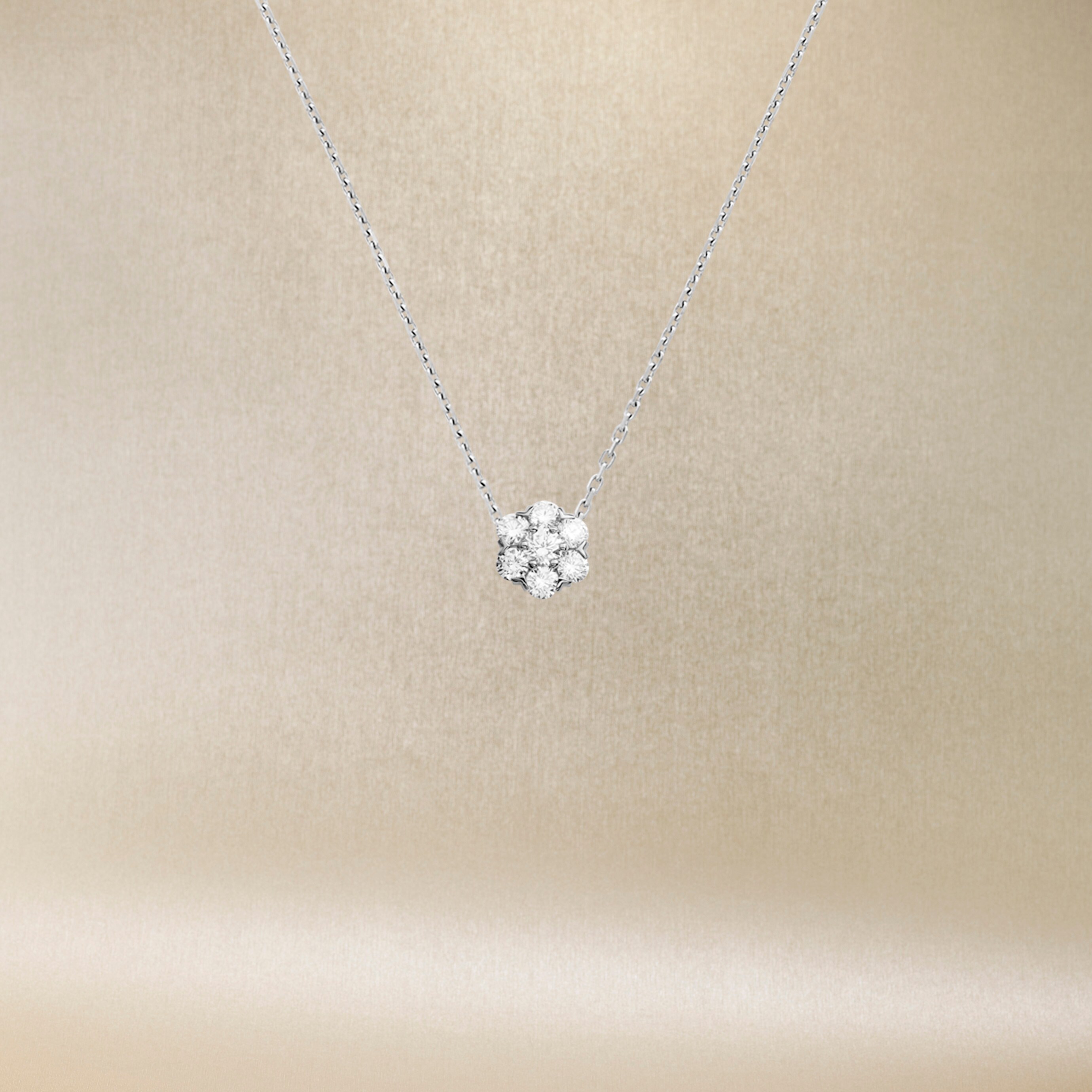 Fleurette pendant, white gold and diamonds. Fleurette collection, Van Cleef & Arpels