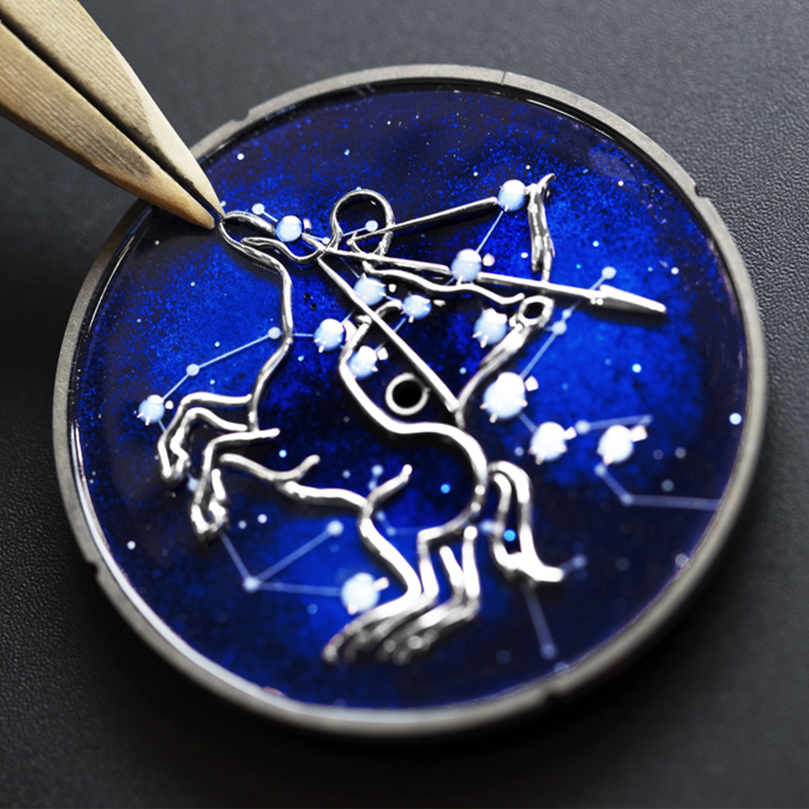 Midnight Zodiaque Lumineux Sagittarii (Sagittarius) watch, rhodium plated 18K white gold, enamel. Self-winding mechanical movement (Valfleurier), on demand lightning animation developed exclusively for Van Cleef & Arpels. Poetic Complications Collection, Van Cleef & Arpels.